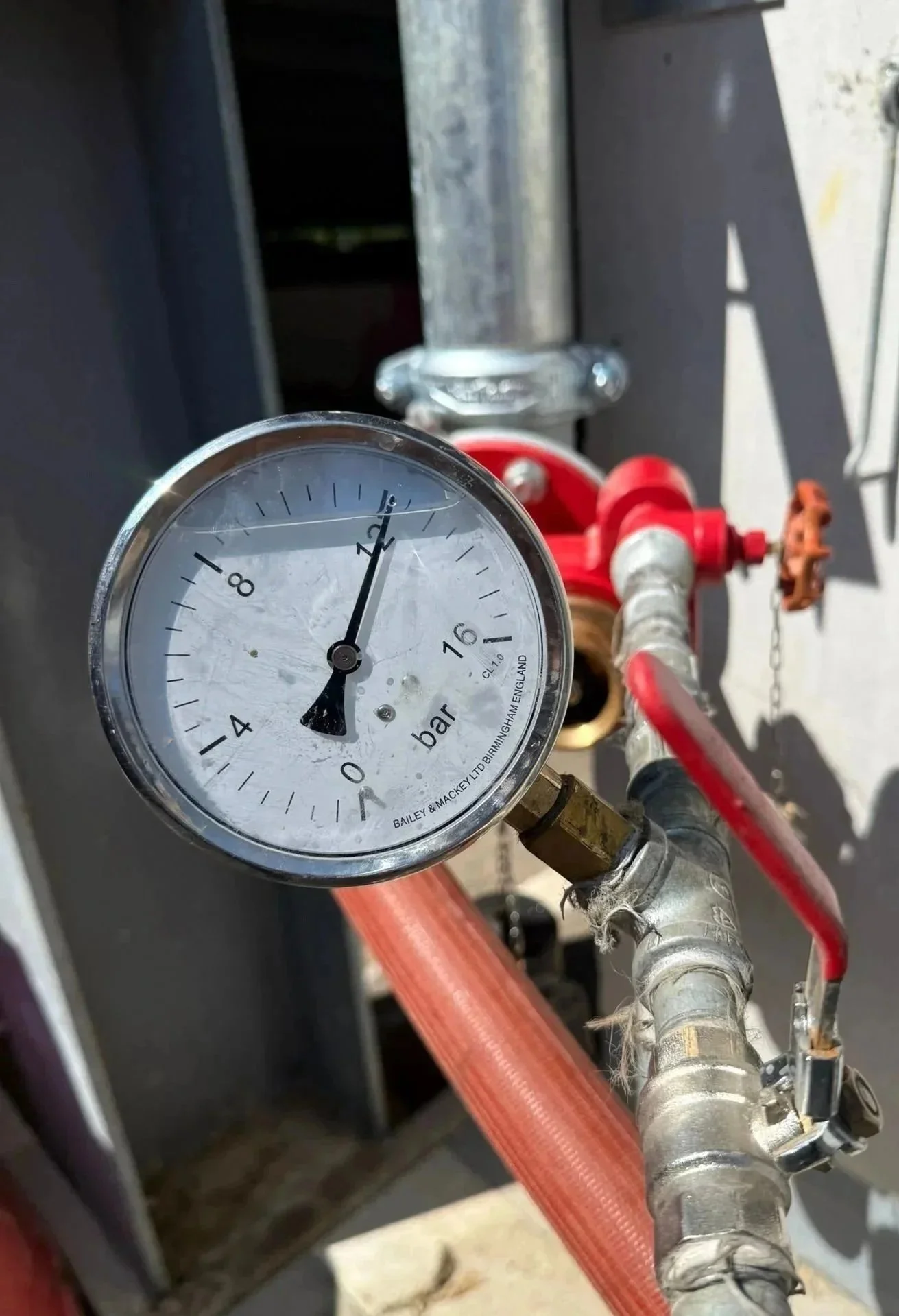 A Pressure Gauge Test on Dry Riser System. System tested to 12 Bar.
