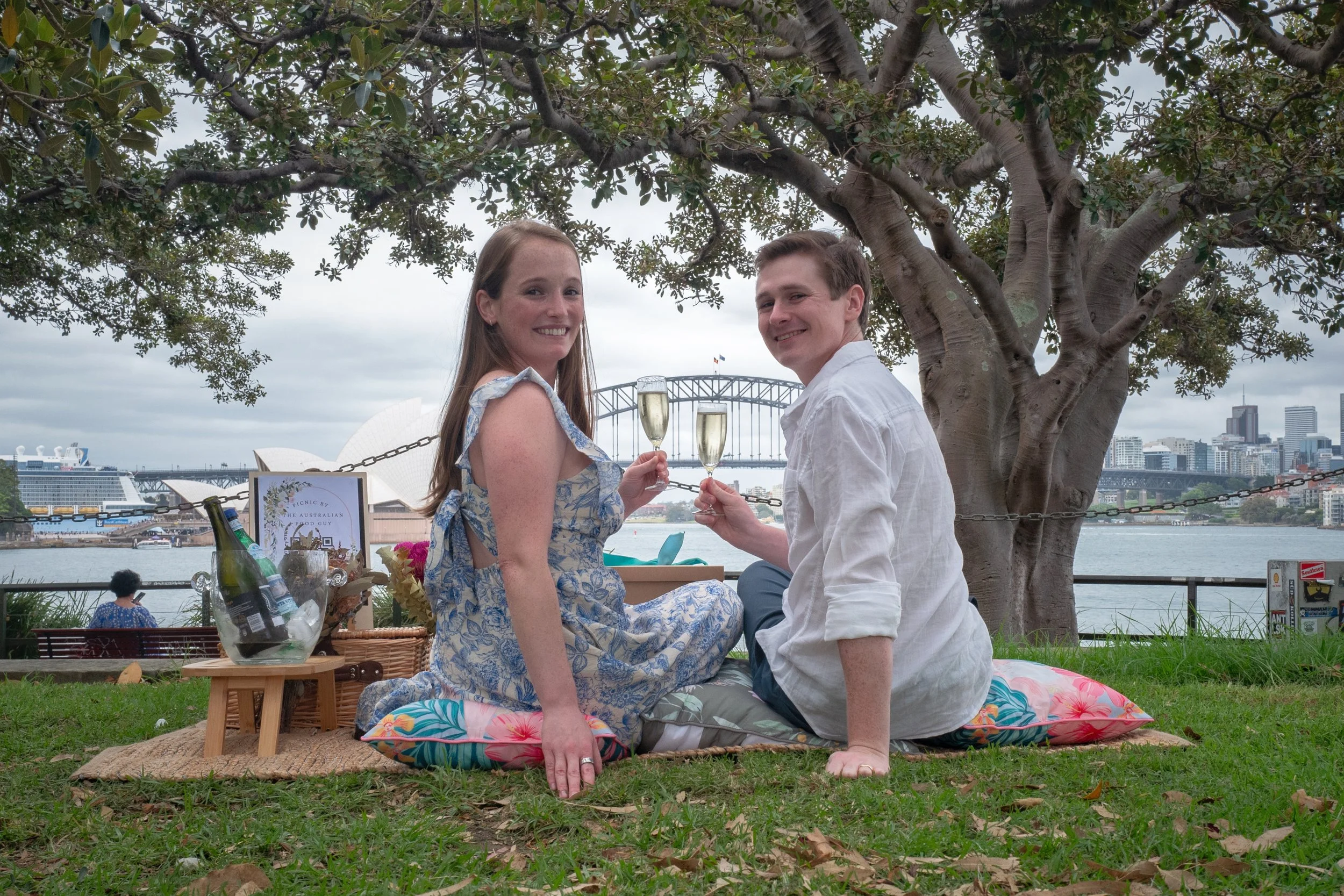 Private Picnic with Opera House View
Description: A luxury bush tucker picnic by The Australian Food Guy set against the Sydney Opera House. Featuring champagne, native flowers and gourmet grazing boxes this Sydney food tour is perfect for couples s