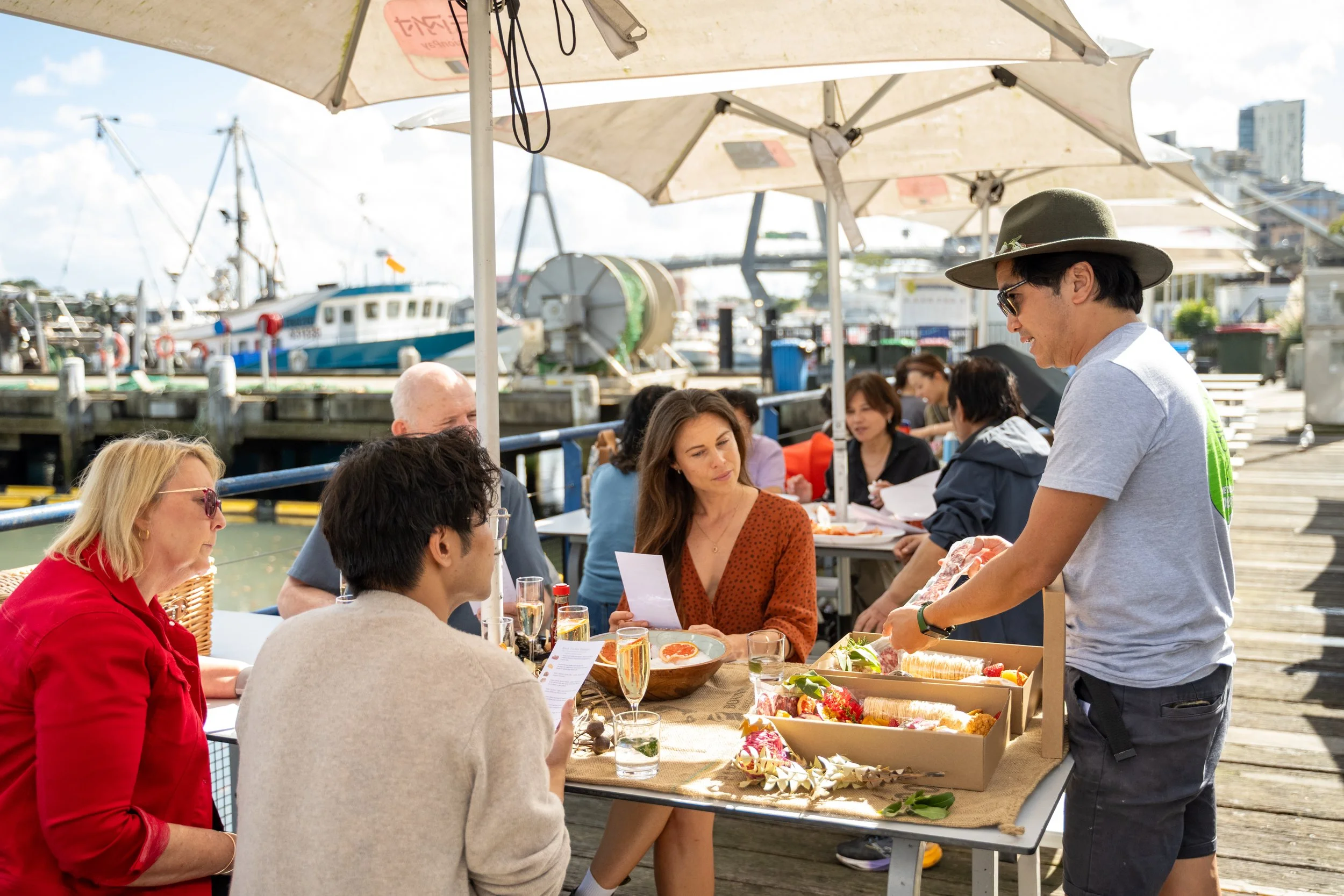 Harbourside Food Tasting
Description: Guests tasting native Australian food by the harbour with The Australian Food Guy. Featuring oysters, bush tucker hampers, and gourmet storytelling, this Sydney food tour is one of the city’s most unique Things