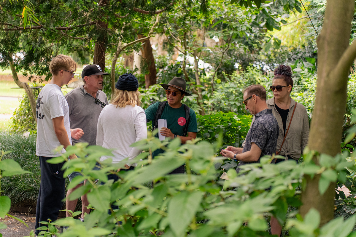 Guests enjoying a private Sydney Discovery Tour through the Royal Botanic Garden with local guide The Australian Food Guy