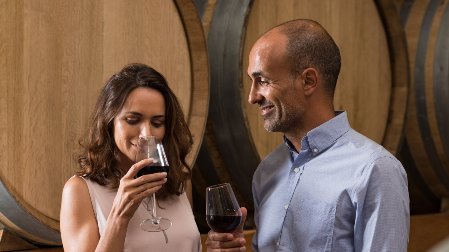 Couple enjoying a wine tasting experience in Sydney as part of The Australian Food Guy’s native flavours and distillery tour.