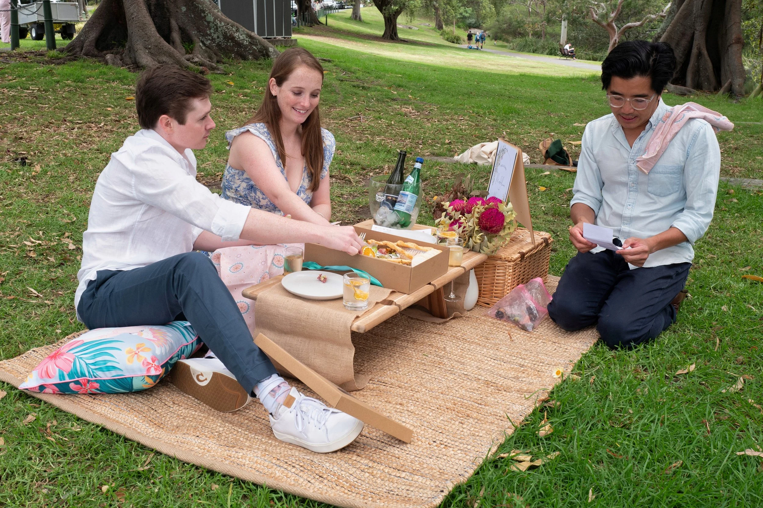 Couple Picnic with Guide
Description: Guests enjoying a private bush tucker picnic hosted by The Australian Food Guy in Sydney. Featuring native Australian food, gourmet grazing boxes and personalised storytelling, this is one of the best food tours