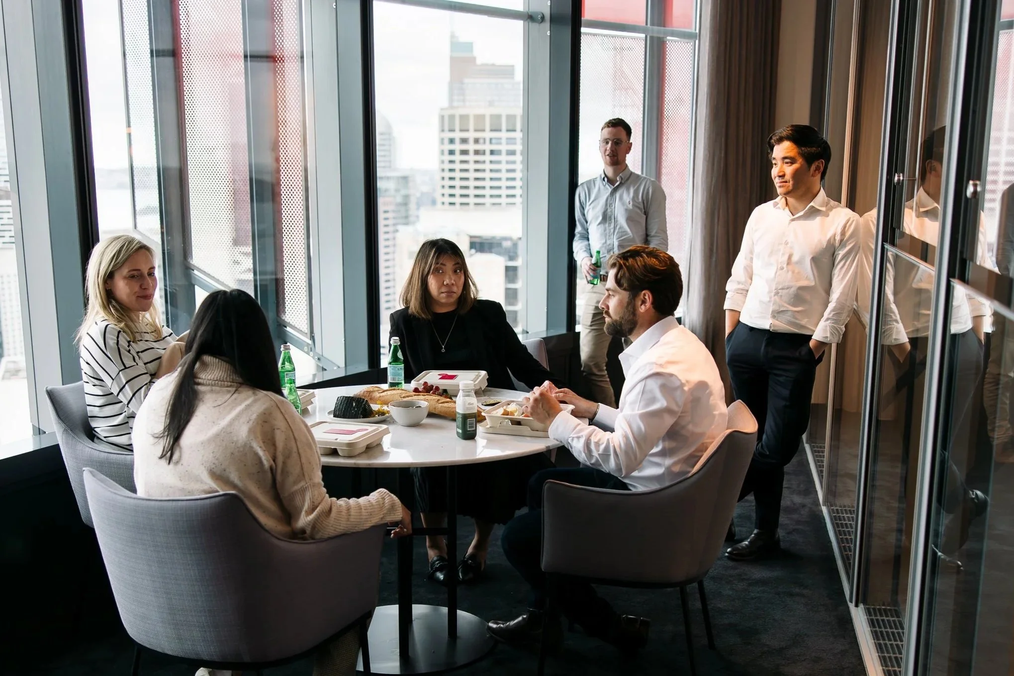Professionals enjoying a premium Sydney corporate food experience and private business lunch with The Australian Food Guy