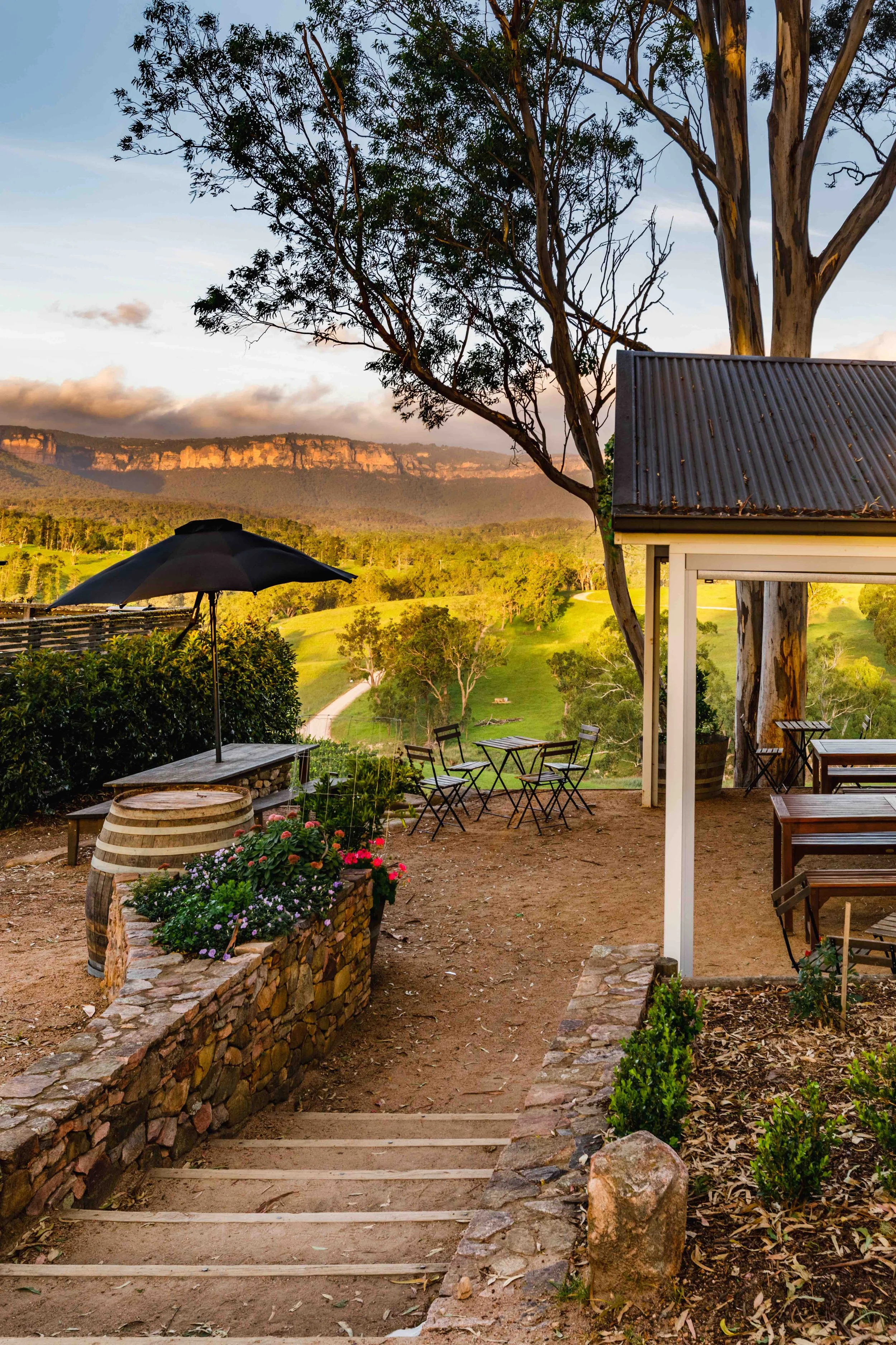 Rustic cellar door in the Blue Mountains
With sandstone walls, wine barrels, and gardens overlooking the valley, Dryridge Estate’s rustic cellar door offers a charming, down-to-earth welcome. Whether part of a Sydney food and wine tour or a full Food