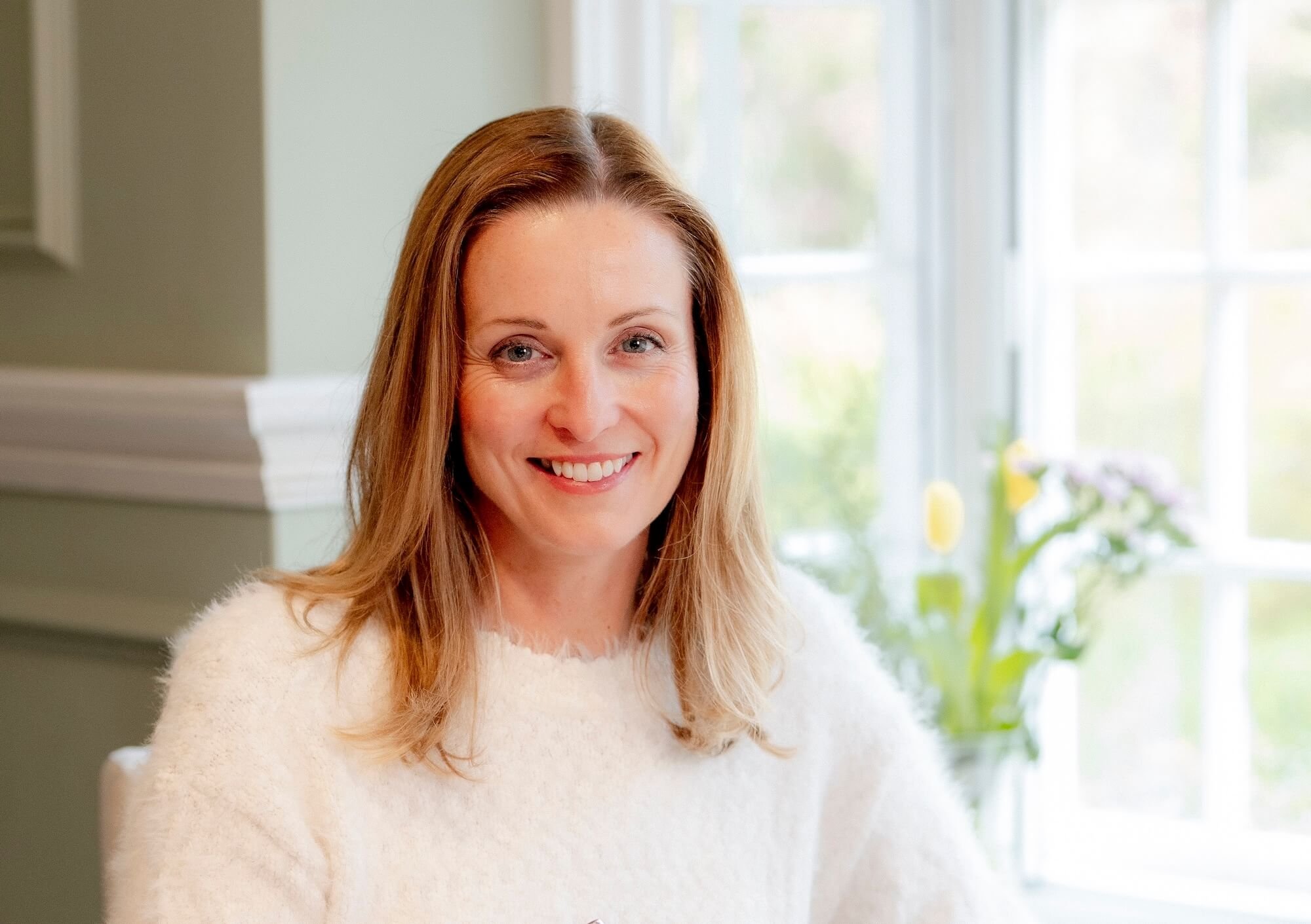 Niamh Ward - Nutritionist and Health Coach close up with a warm smile