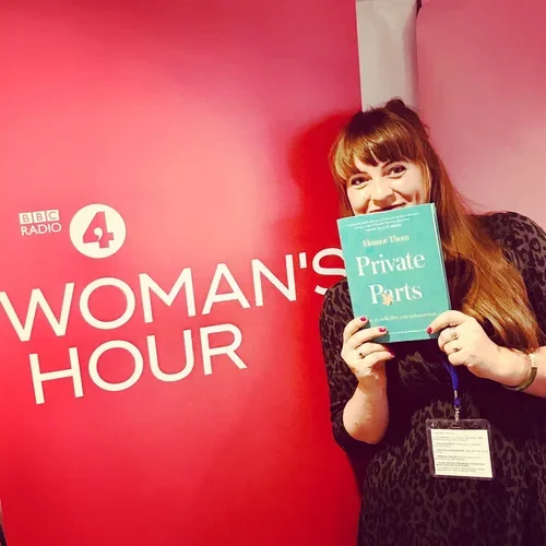 A woman standing in front of a pink background with BBC Radio 4 Woman's Hour logo, holding a book titled "Private Parts."