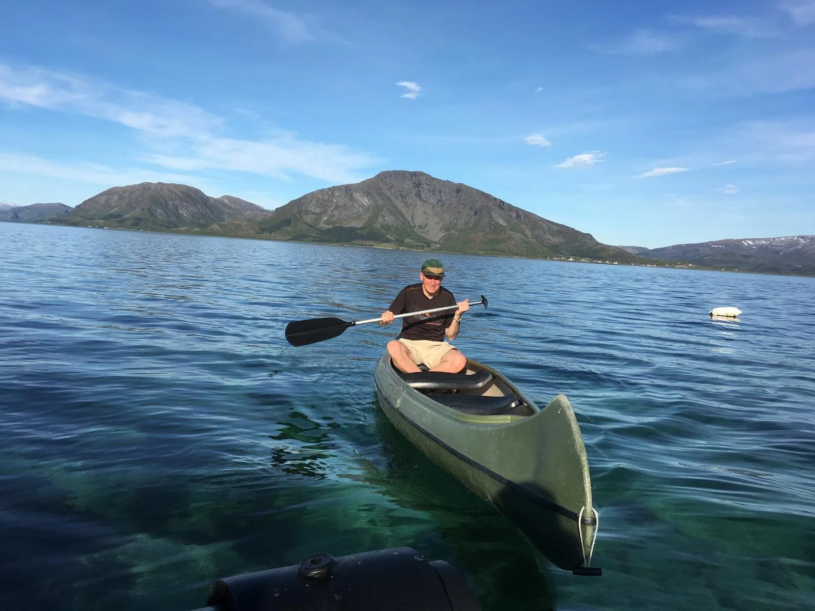 Couple paddling a canoe during a guided canoe tour near Lillehammer in Norway