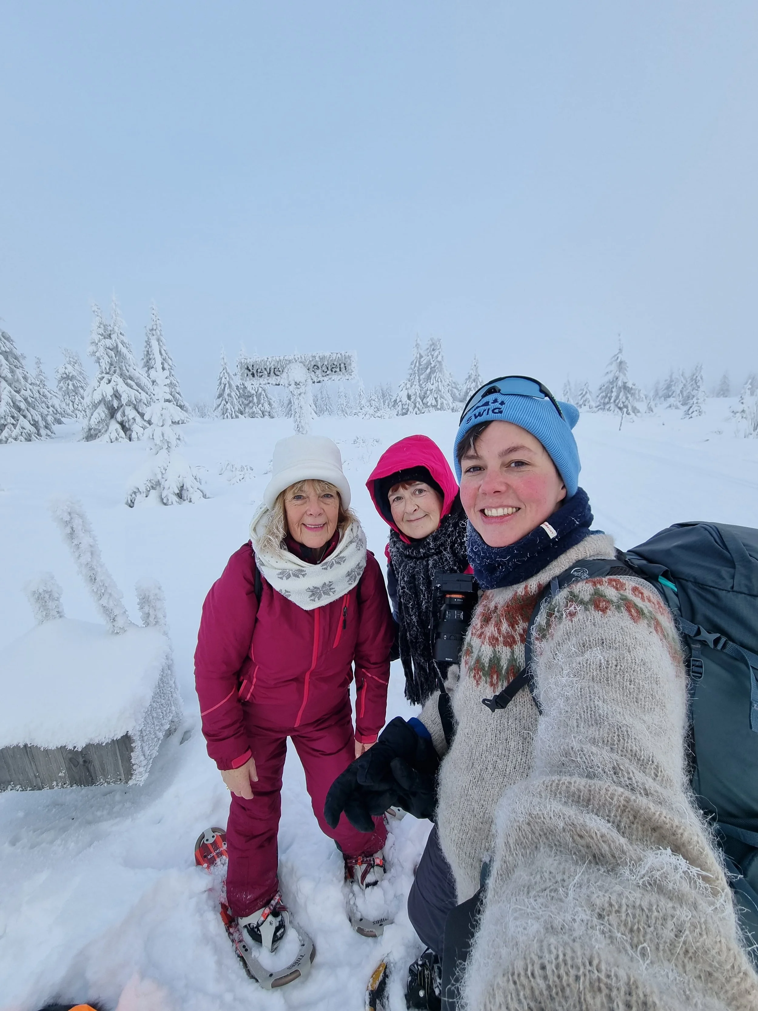 Snowshoe hiking in winter forest at Nordseter