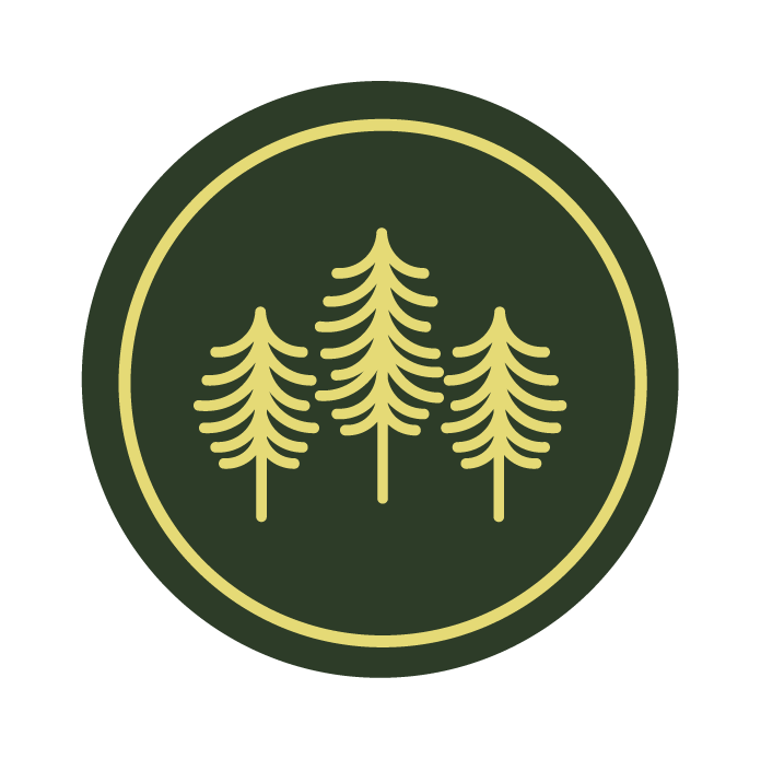 a green round icon of three fir trees
