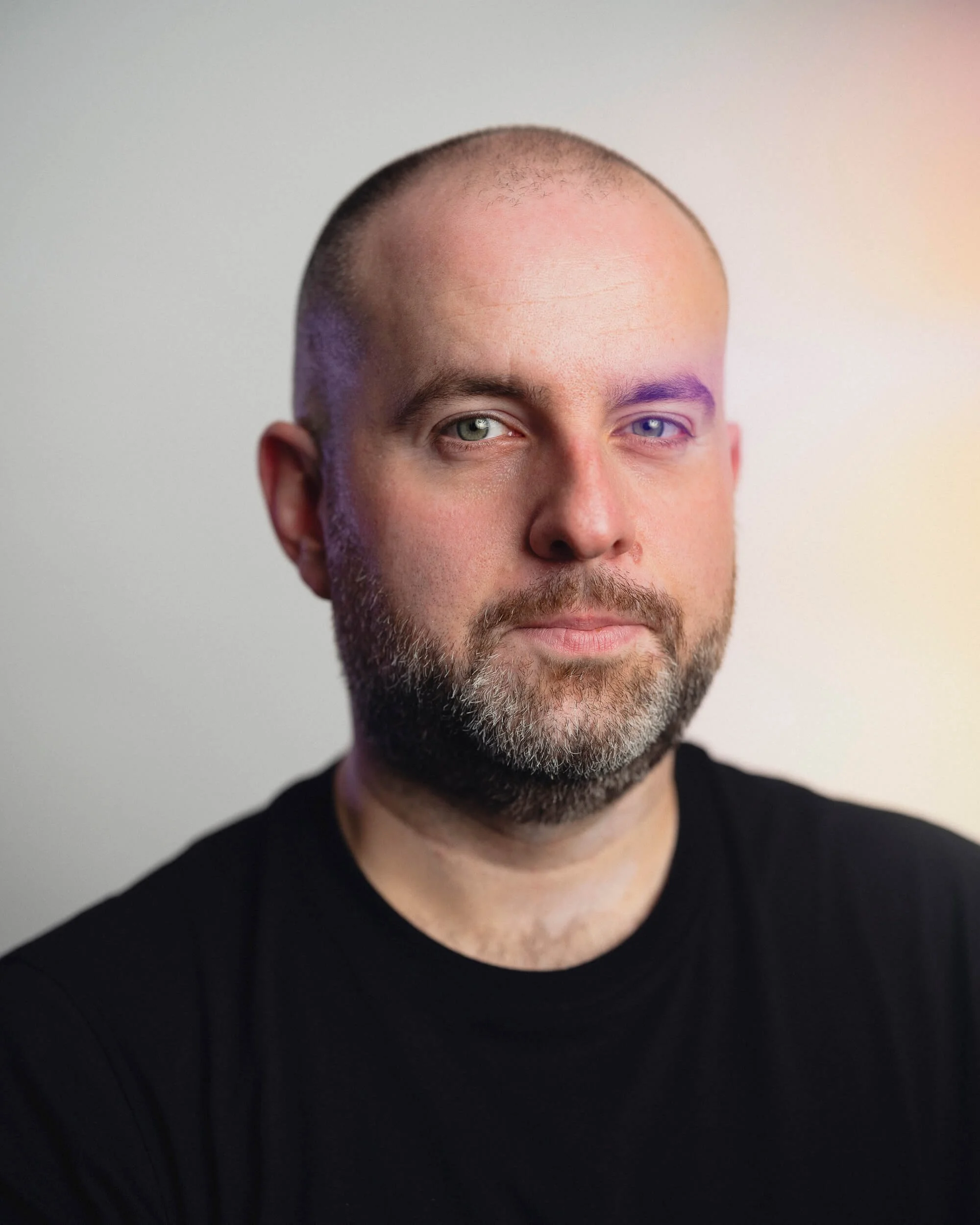 Business headshot photograph of a man