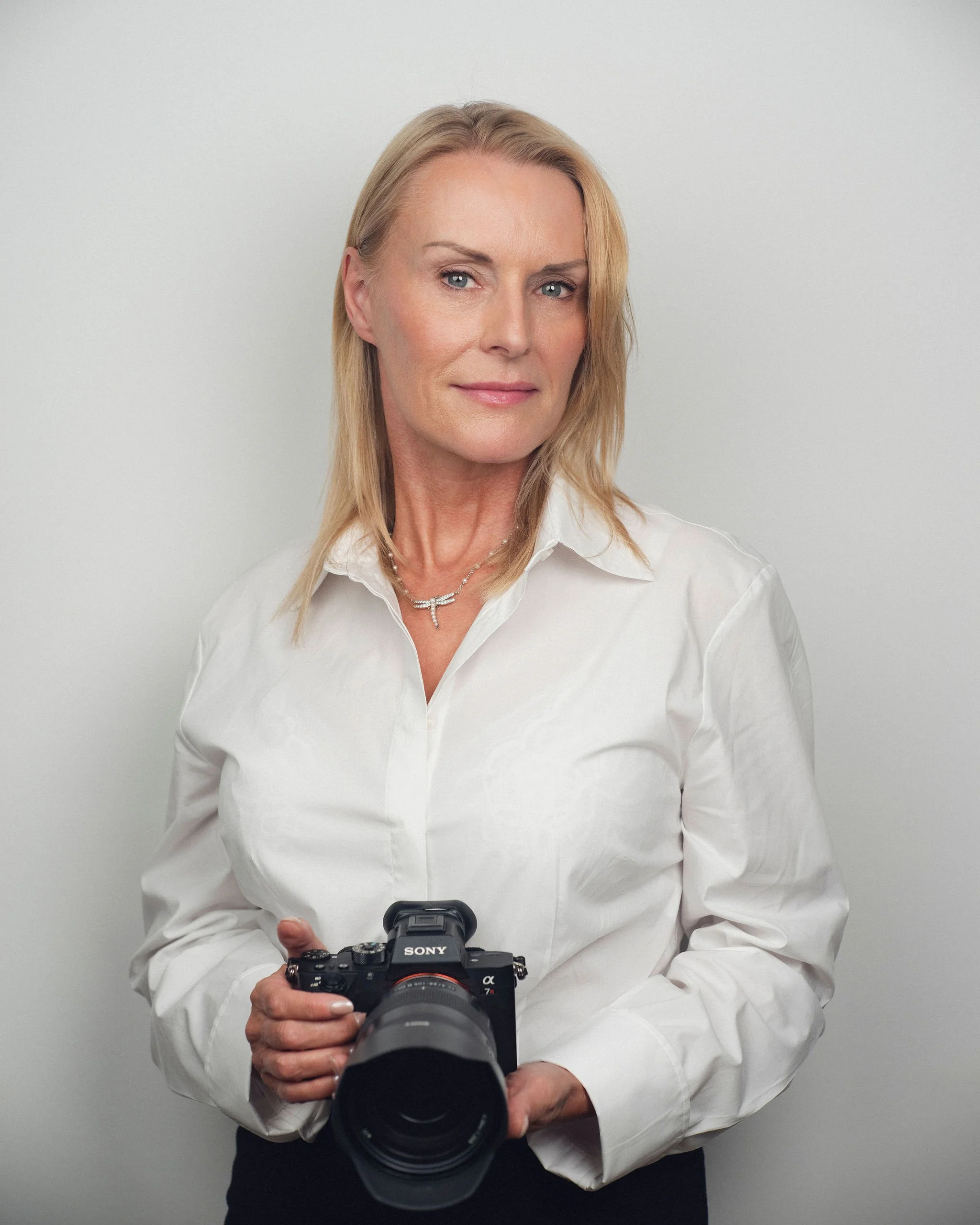 Business headshot photograph of a woman
