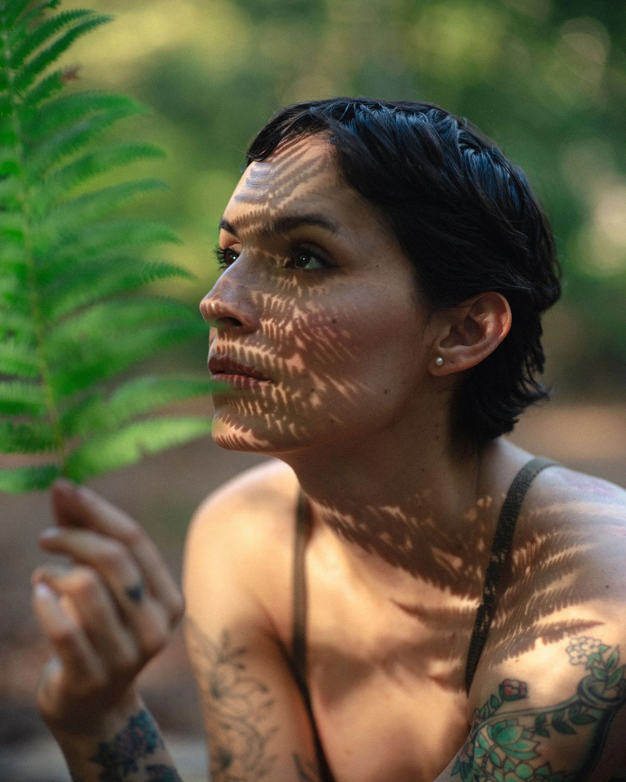 Personal branding image of Reiki healer in forest photoshoot