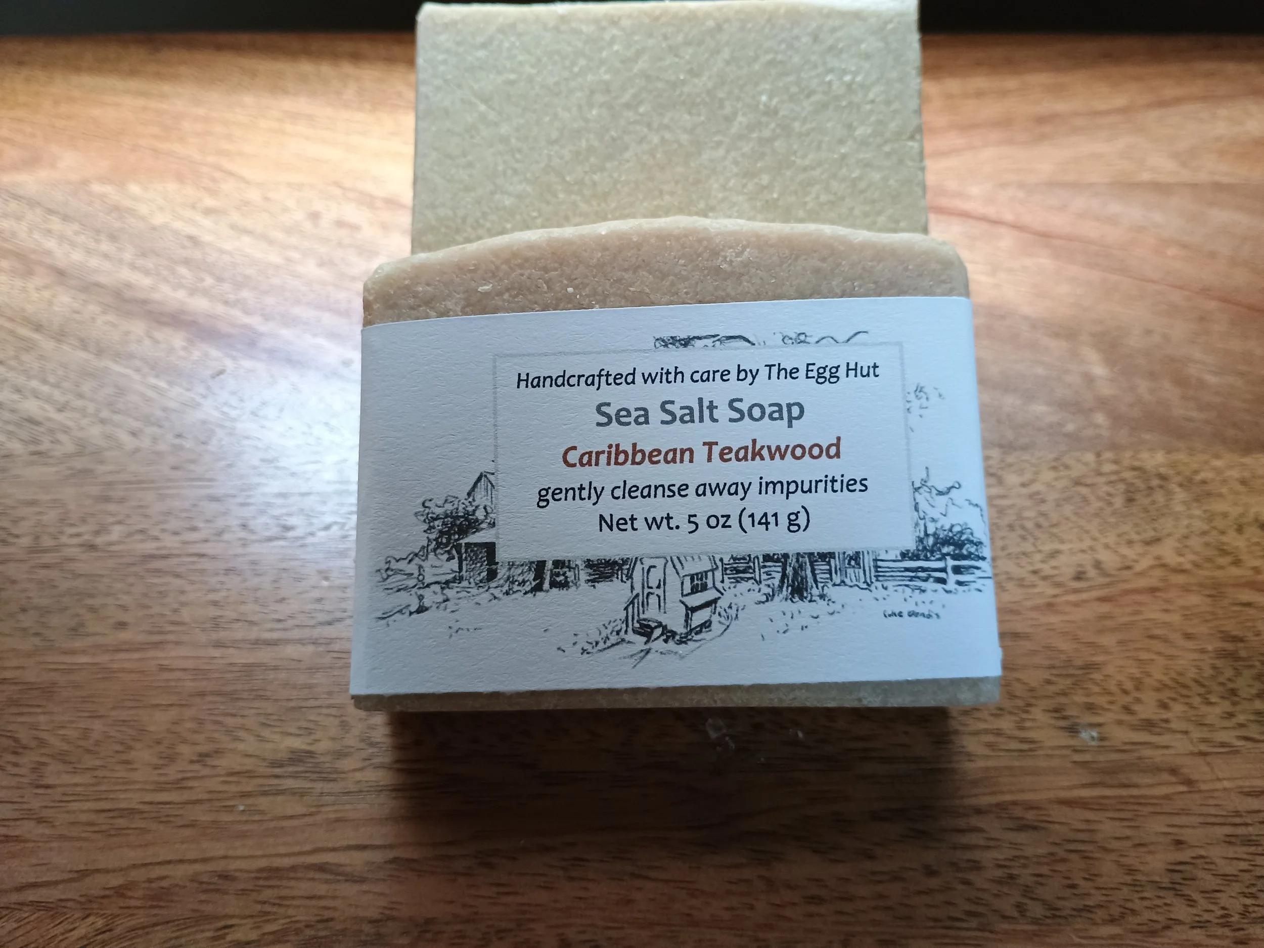 Caribbean Teakwood soap package with tan colored soap bar