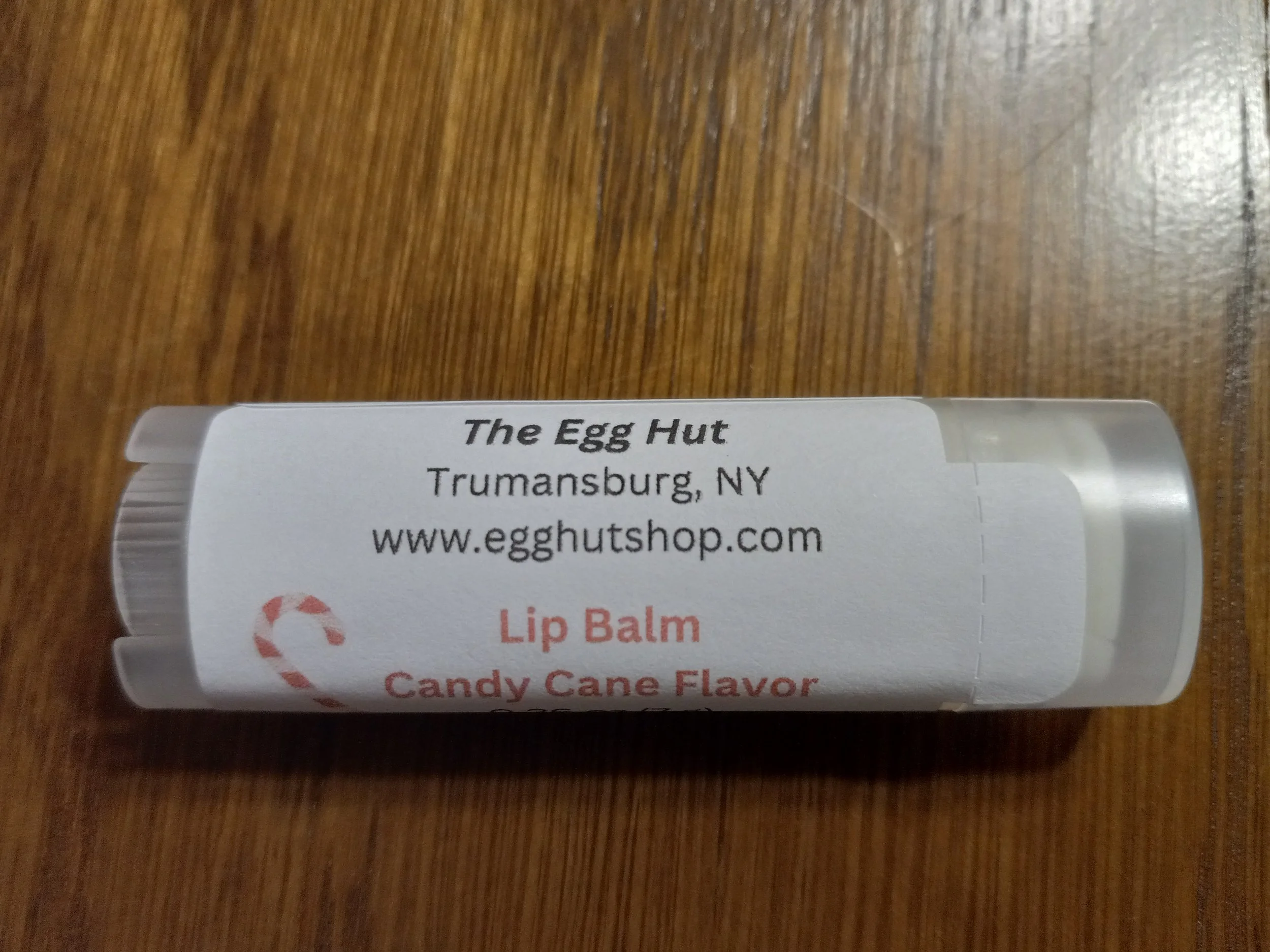 labeled candy cane flavored lip balm tube.