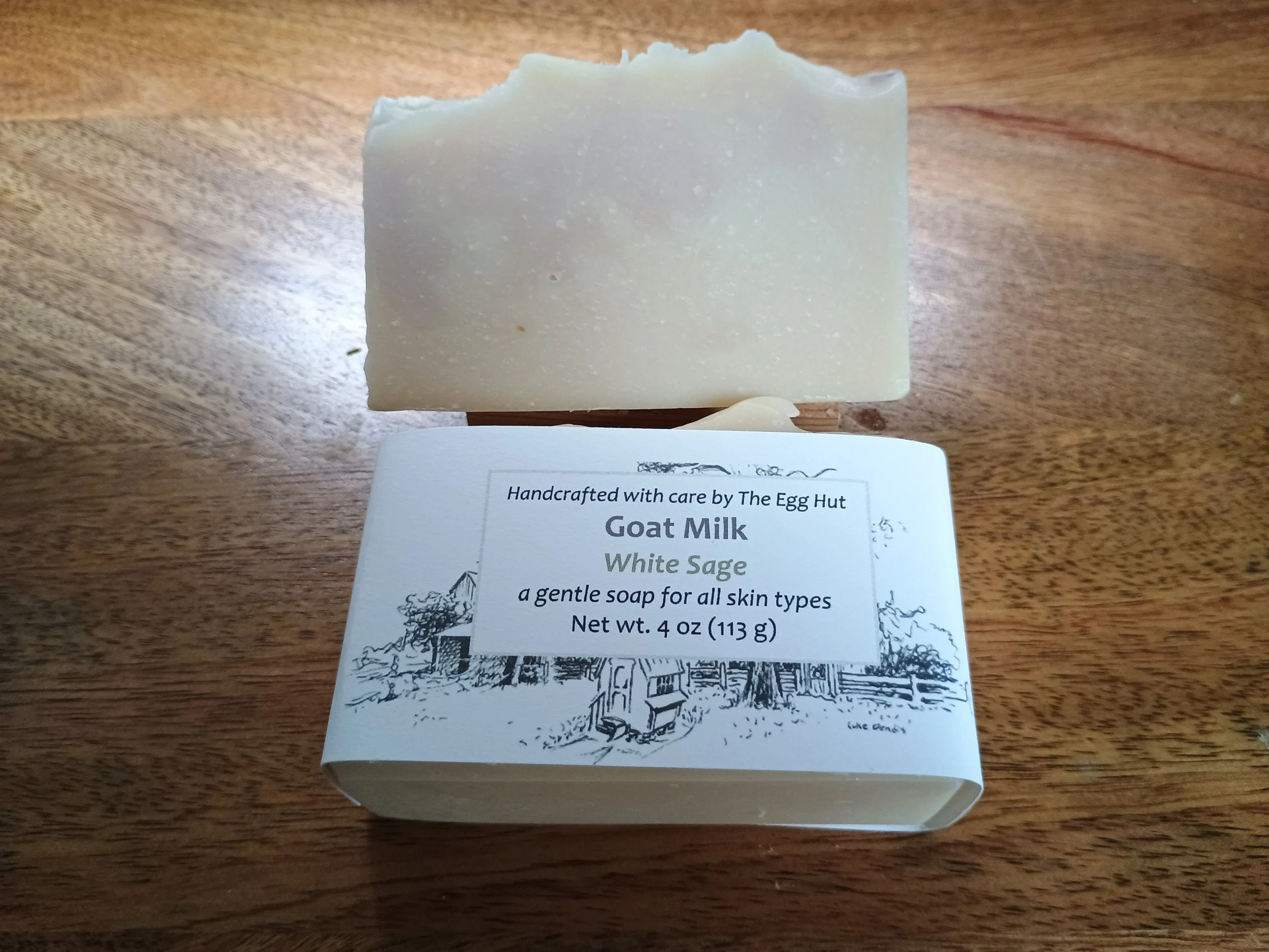 White Sage Soap package and cream soap with light purple swirls
