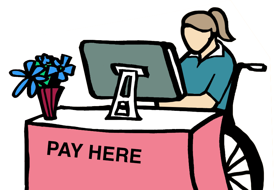 A woman sitting at a checkout counter with a sign that says 'PAY HERE', a blue flower in a red vase, and a computer monitor.