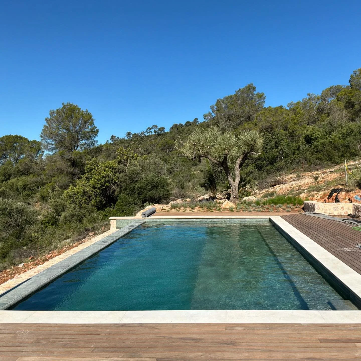 On_Site 
Set discreetly into the folds of Mallorca&rsquo;s Tramuntana, this large family villa is beginning to emerge. Spring has done its part. What was once excavation and retaining walls is turning green again, softening back into the landscape it