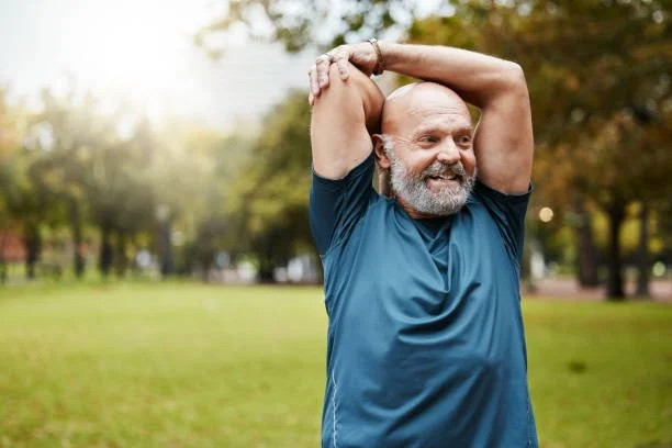 older man training and stretching for mobility