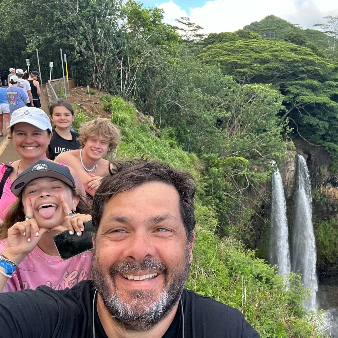 Matt Miale on vacation with family at a waterfall