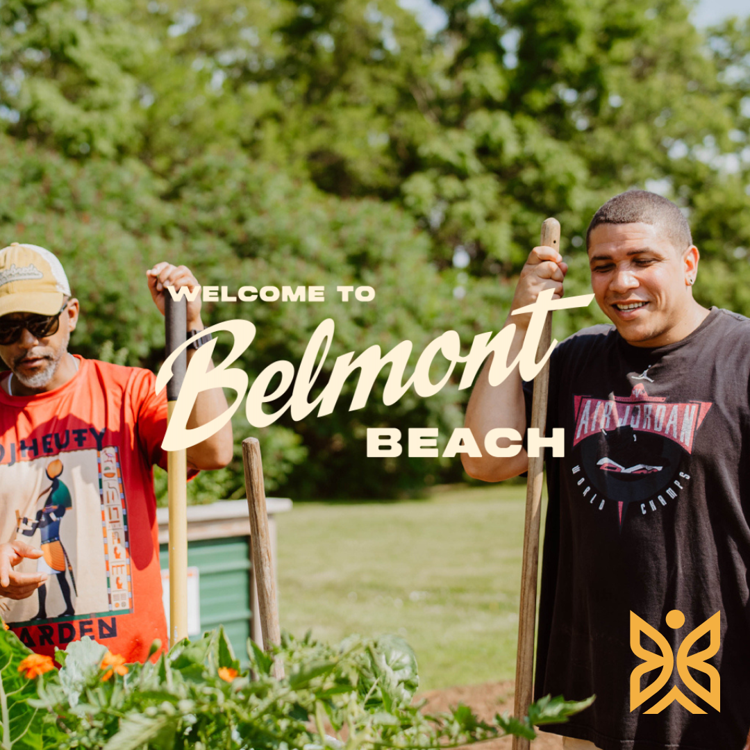 Two men smiling and holding shovels in a lush outdoor setting with green trees, surrounded by plants, during daytime, promoting Belmont Beach.