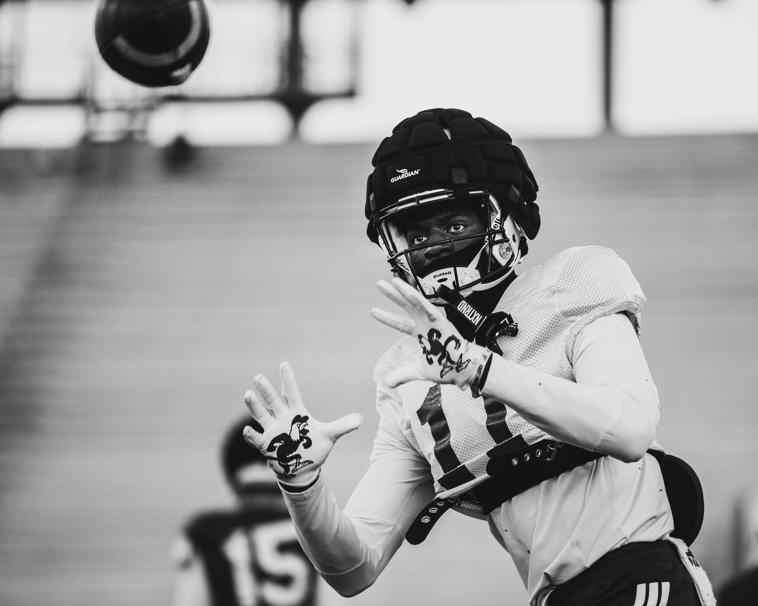 This photo was taken during practice, it was put into black and white because that was our theme for the week for our upcoming Kennesaw game. This was one of three others of mine that was posted on socials.