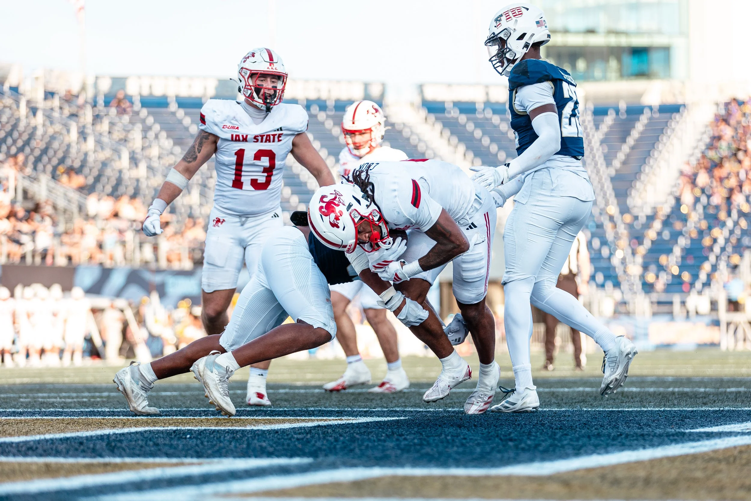 This is another touchdown photo from the FIU game where our running back, Cam Cook, ran and scored us a touchdown.