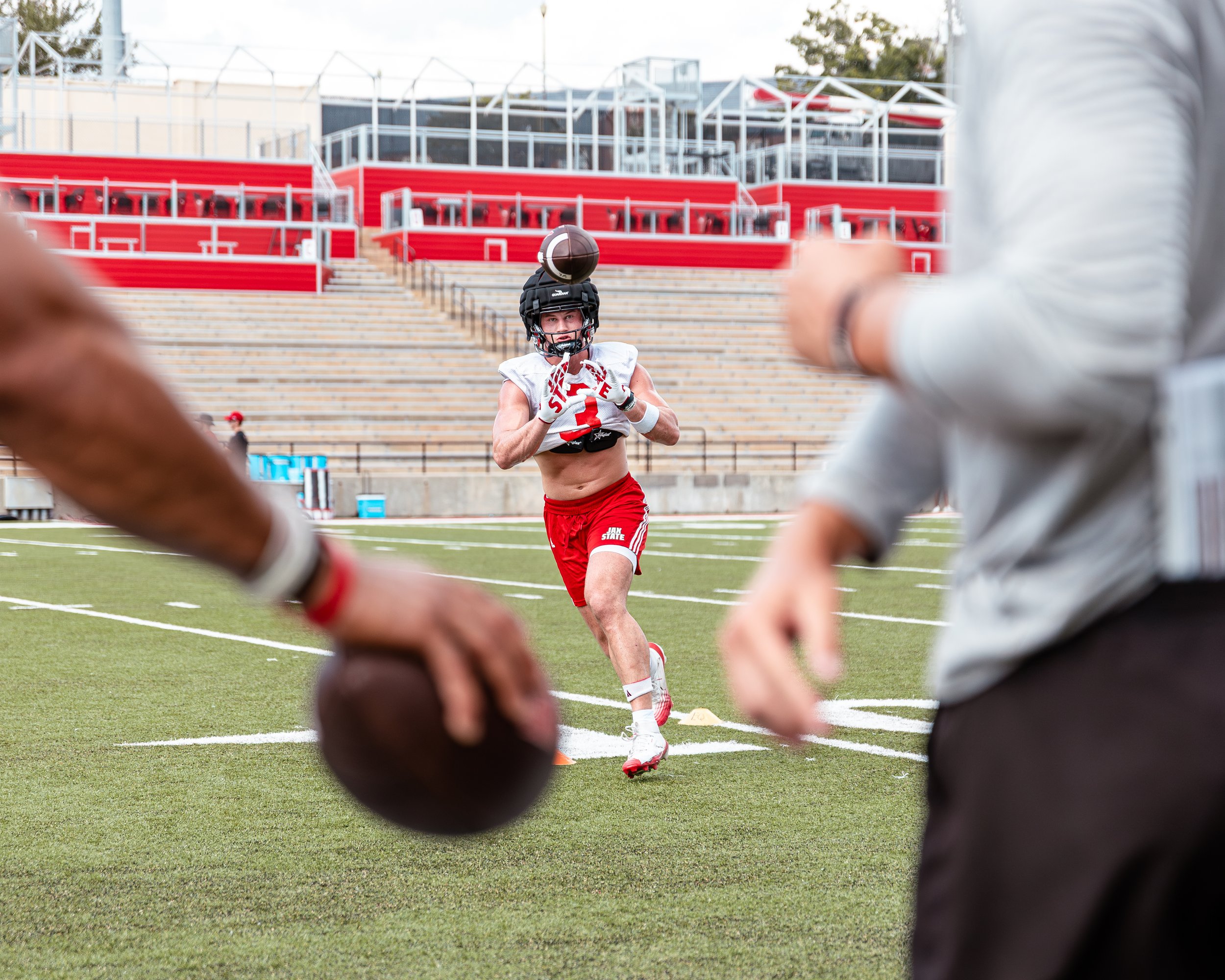 This photo was taken during the team's first week of fall camp. It was one of my first sports photos I have taken and was proud of. The composition tells a great story.