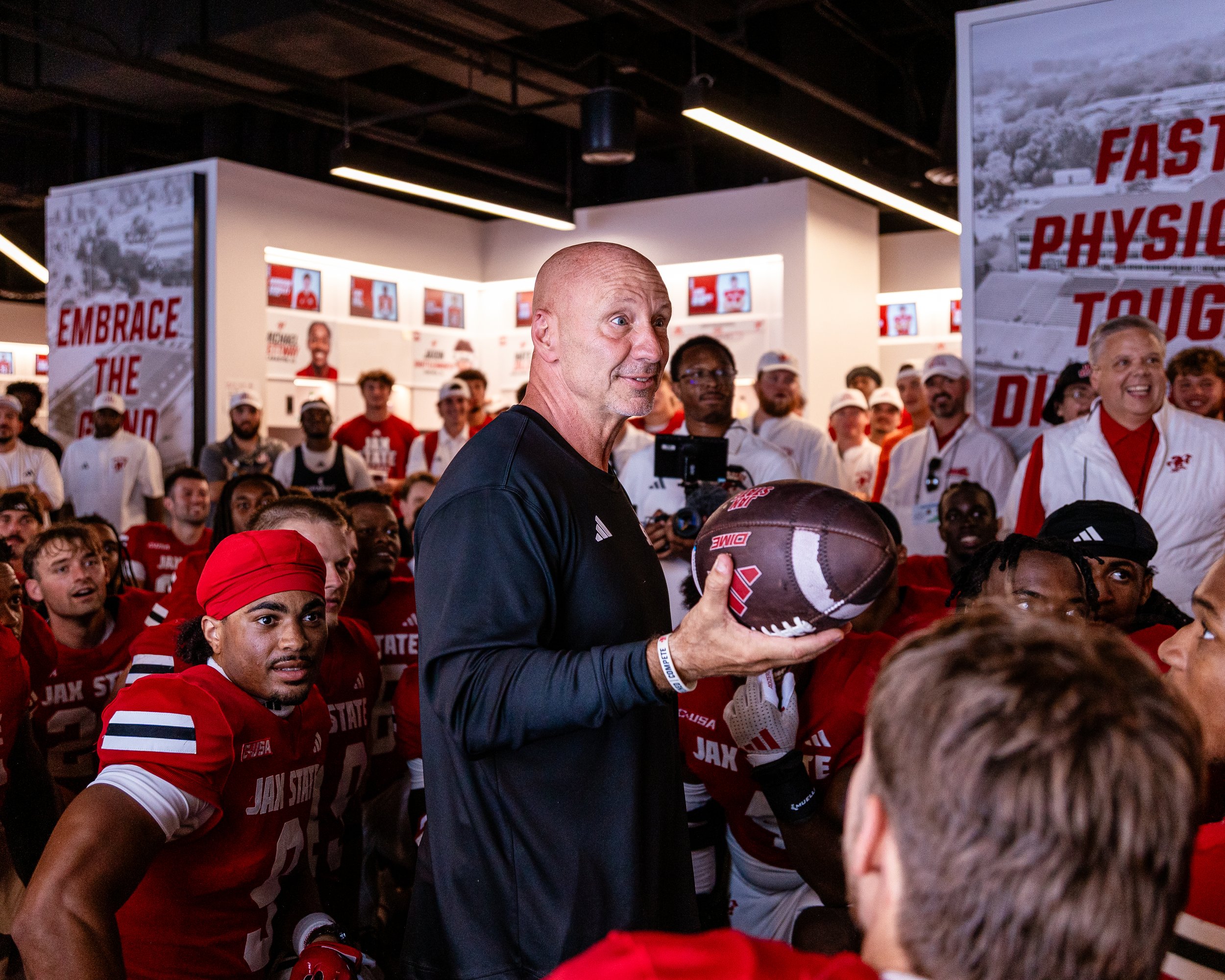 This photo was taken in the locker room after Coach Kelley’s first ever home game win against Liberty. 