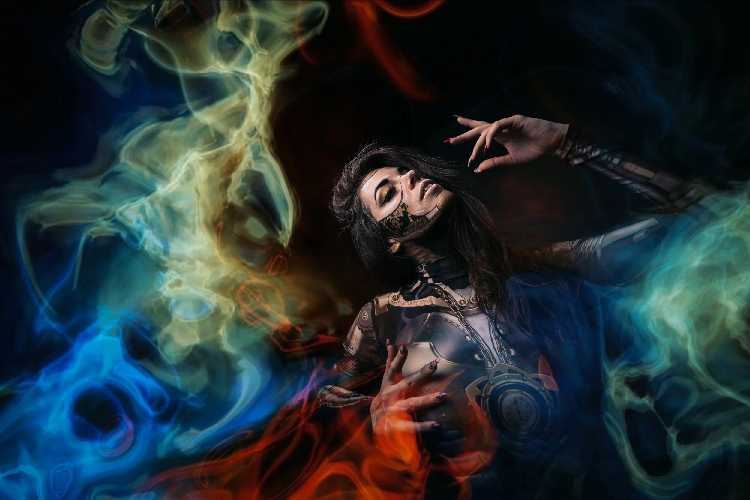 A woman with dark hair, makeup, and face tattoos, lying amidst colorful swirling smoke, wearing a futuristic outfit with metallic and leather elements, holding a small container, with a mysterious and artistic vibe.