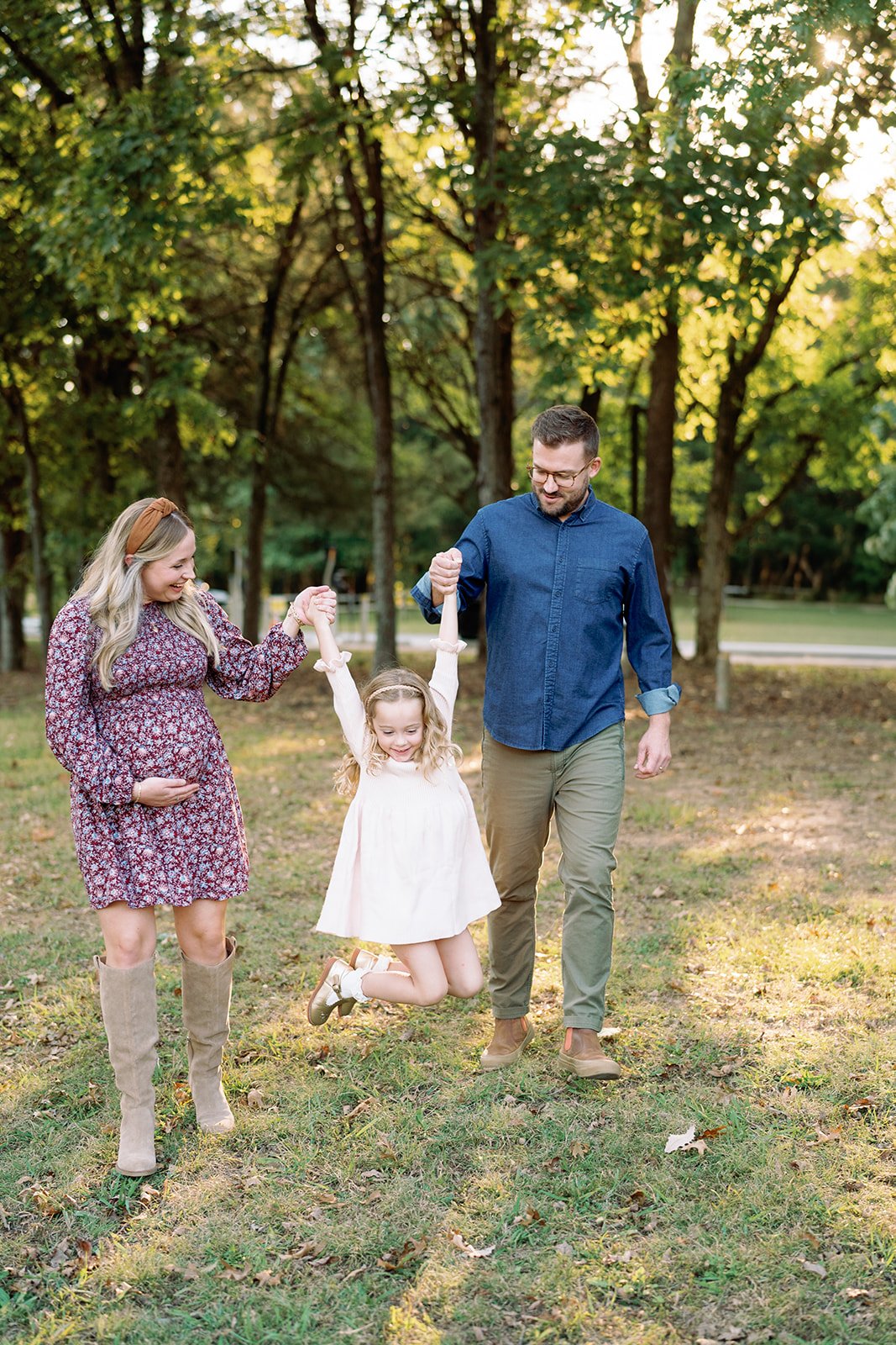 A maternity session of a family of three at Nashville State Park, Long Hunter State Park, in Nashville, Tennessee.