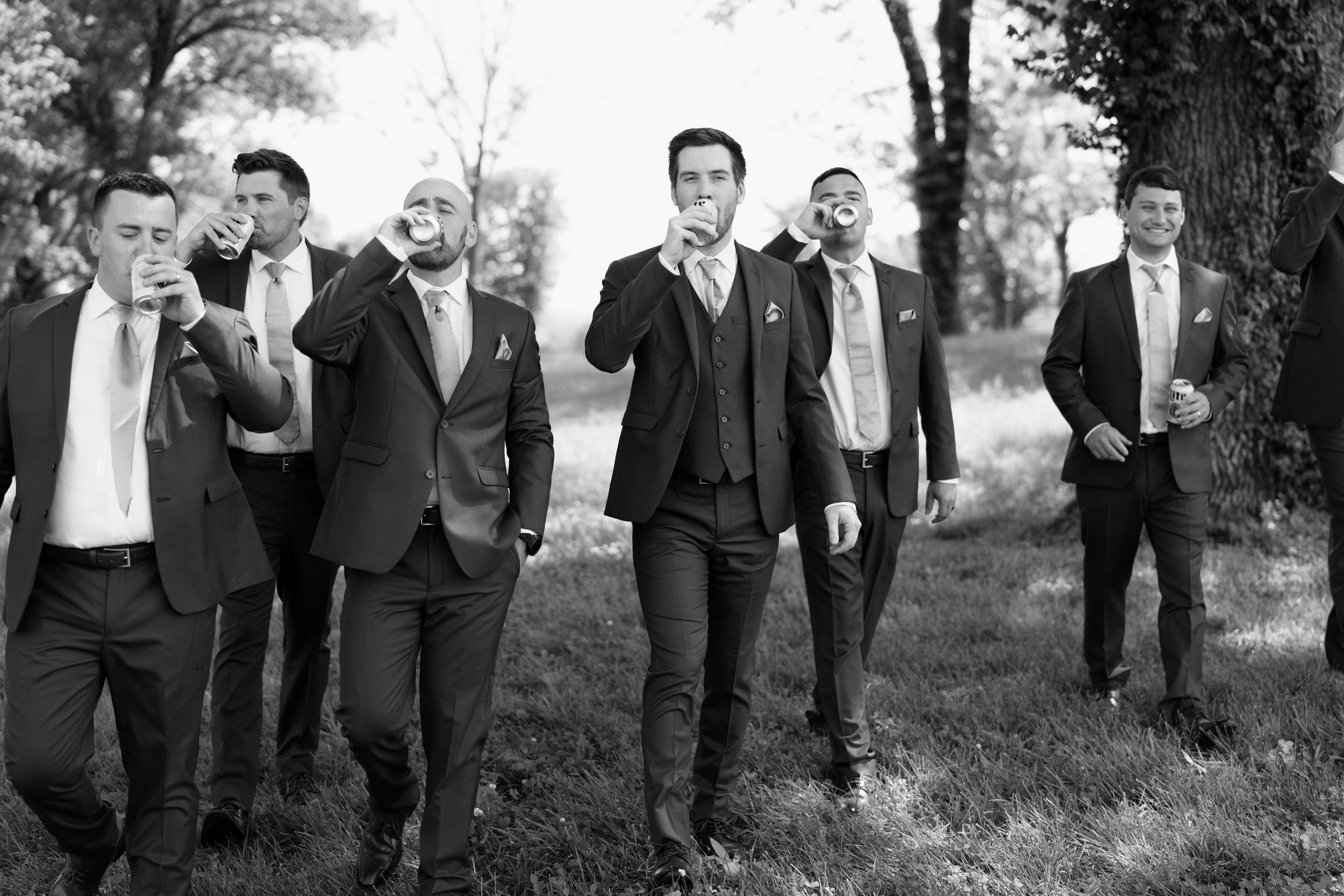 Groom and groomsmen walking together and celebrating before wedding ceremony, Tennessee weddin