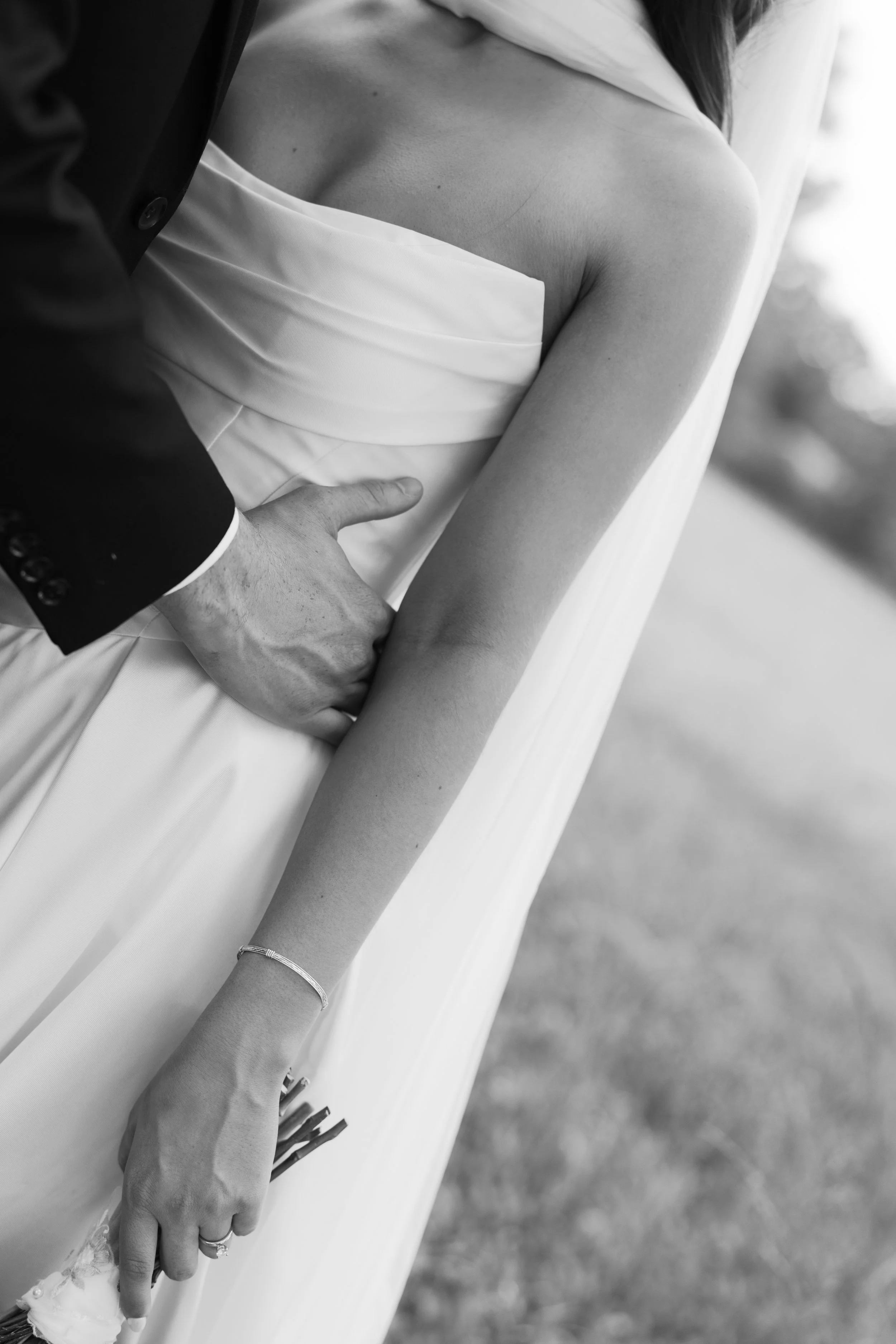 Groom's hand on bride's waist during wedding portrait session, Tennessee wedding photographer