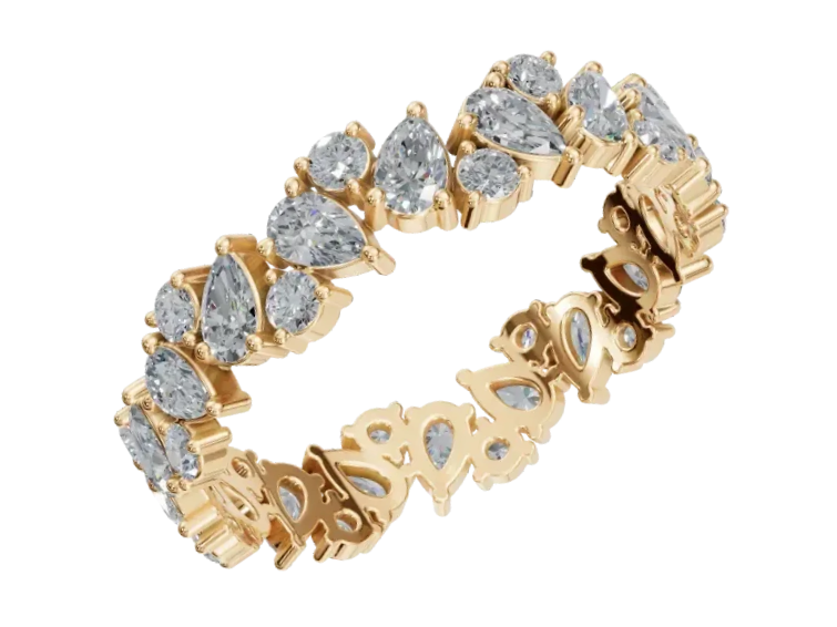 Gold ring with alternating pear-shaped and round diamonds and the word "DADDY" engraved on the inner band.