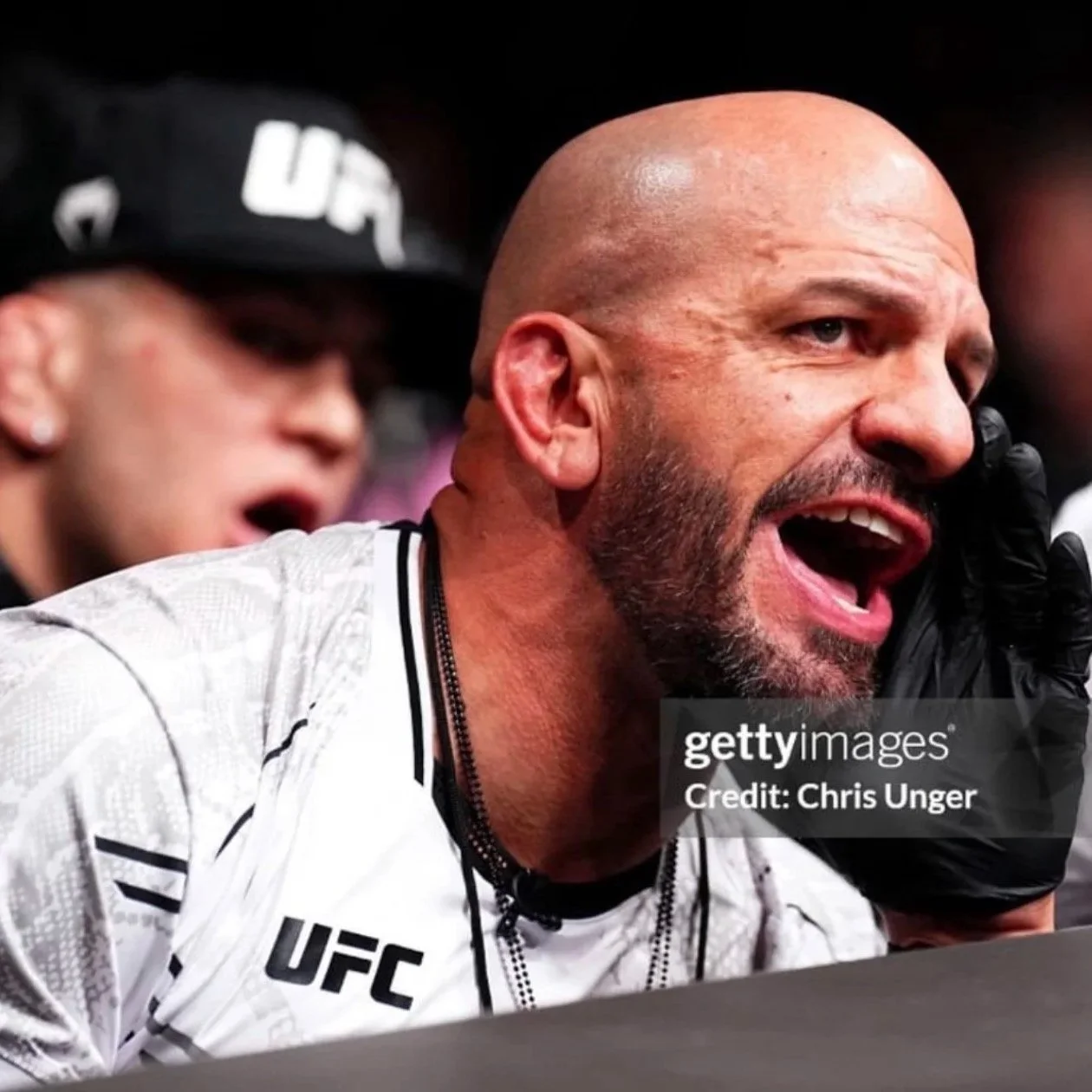 Coach Marc Montoya and Cody Brundage cage-side at the UFC.