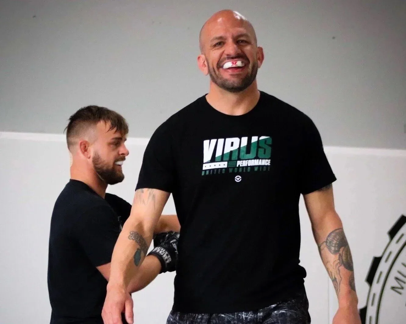 Coach Marc Montoya smiling while training at Factory X in Englewood, Colorado.