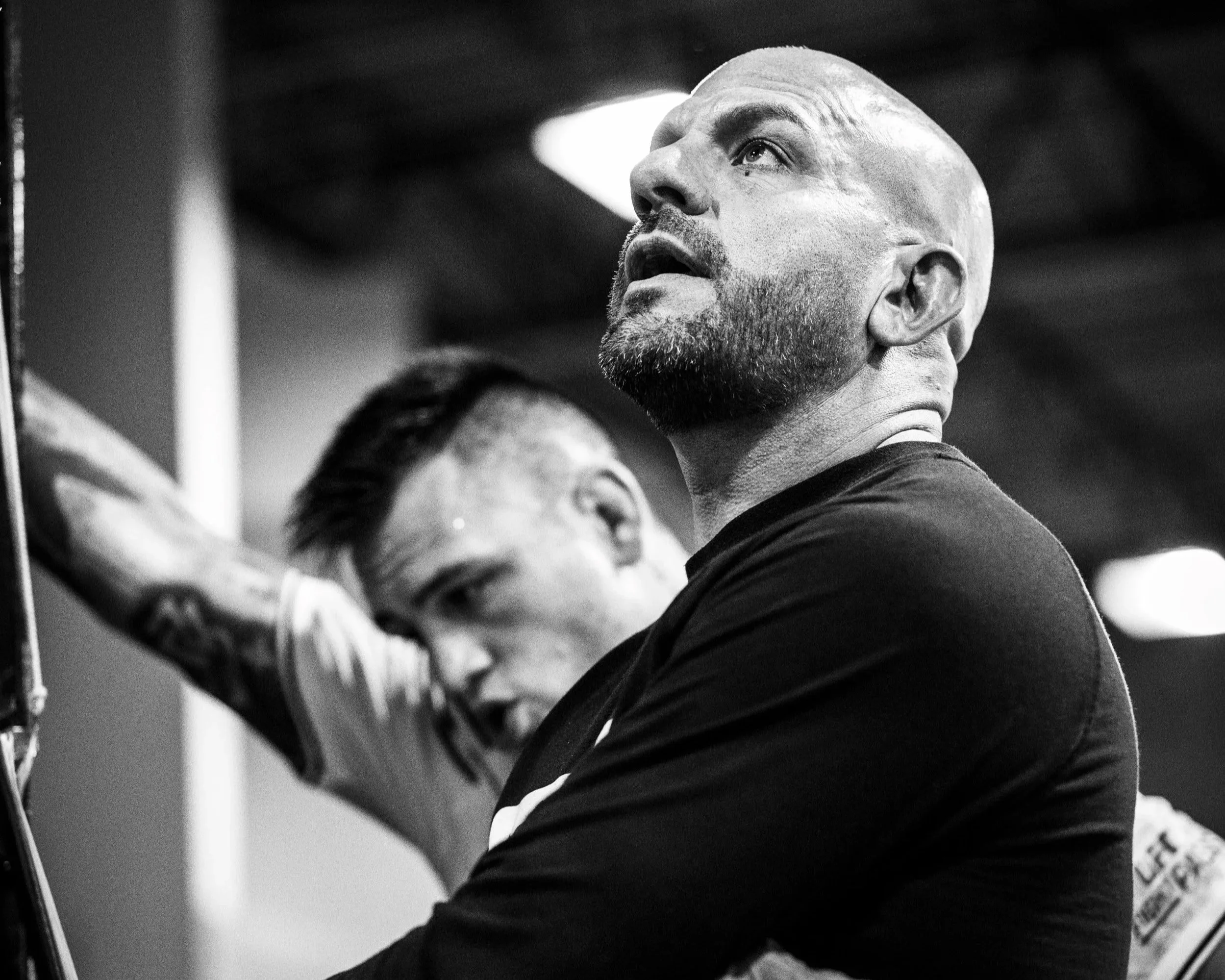 UFC fighter Cody Brundage and Coach Marc Montoya coaching cage-side at Factory X in Englewood, Colorado. 