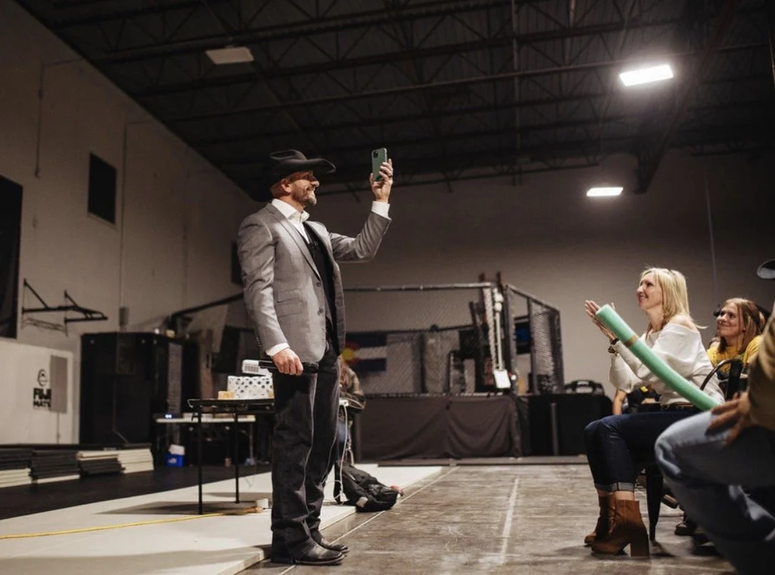 	Coach Marc Montoya FaceTiming PFL millionaire winner Rob Wilkinson at Factory X in Englewood, Colorado