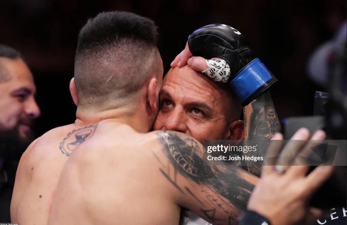 UFC fighter Cody Brundage embracing Coach Marc Montoya following a UFC win.