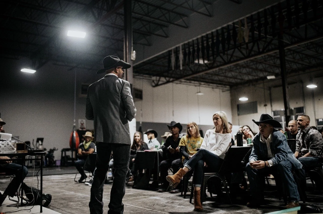 Coach Marc Montoya addressing the crowd at a party at Factory X, Englewood, Colorado. 