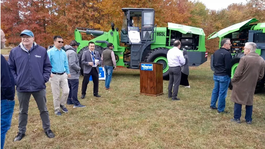 people looking at the equipment