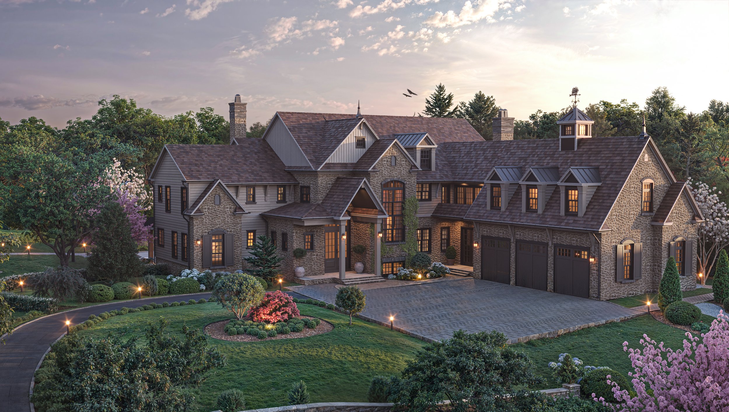 Large house with stone and siding exterior, multiple gabled roofs, dormer windows, and a spacious driveway, surrounded by landscaped gardens and trees, during dusk.