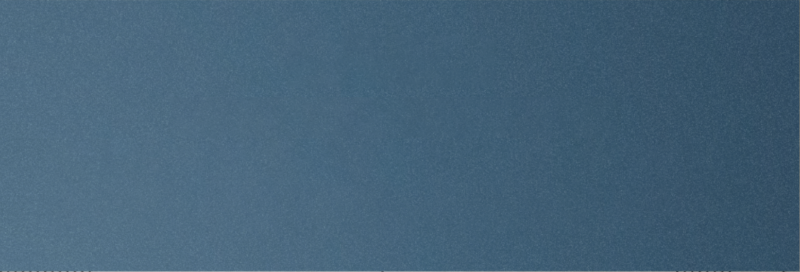 Close-up of a blue textured surface with a light gradient.