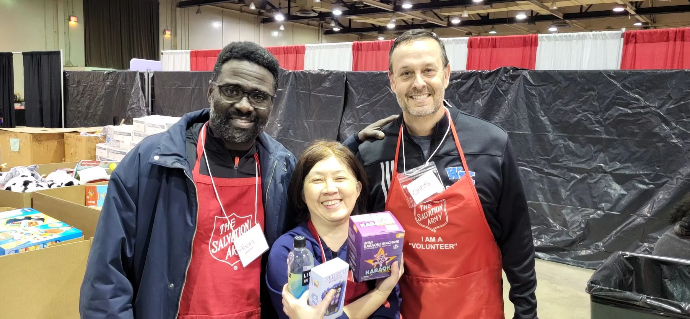 Asendo Team providing toys and food boxes at the Salvation Army's Christmas Cheer Program.