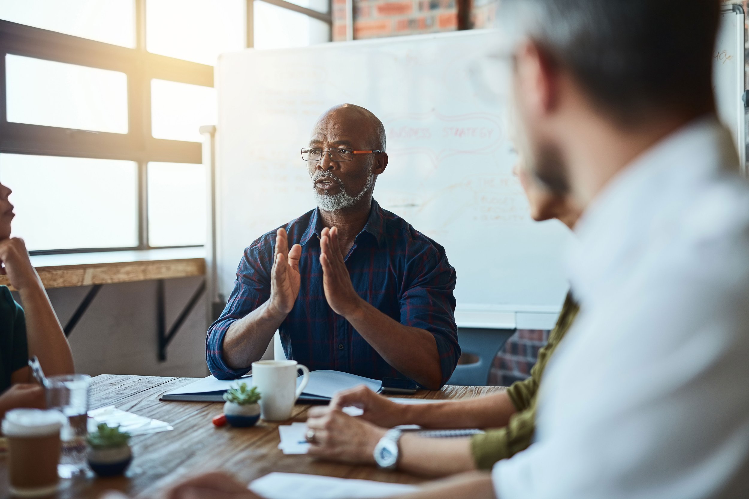 Middle aged businessman in a meeting