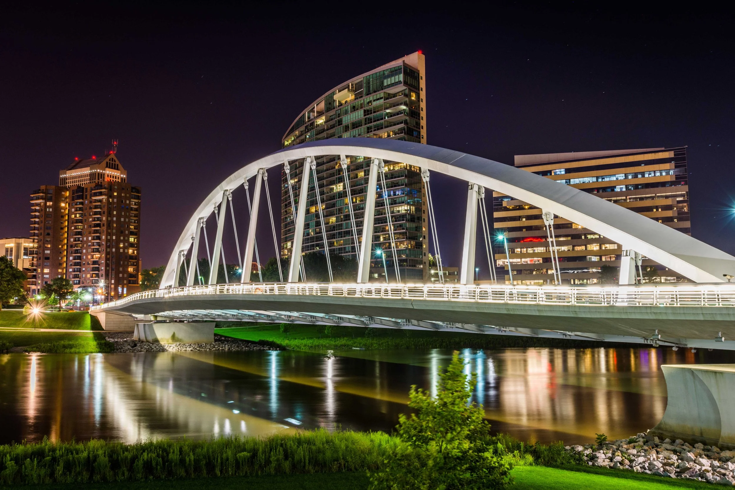 Columbus skyline at night overlooking bridge