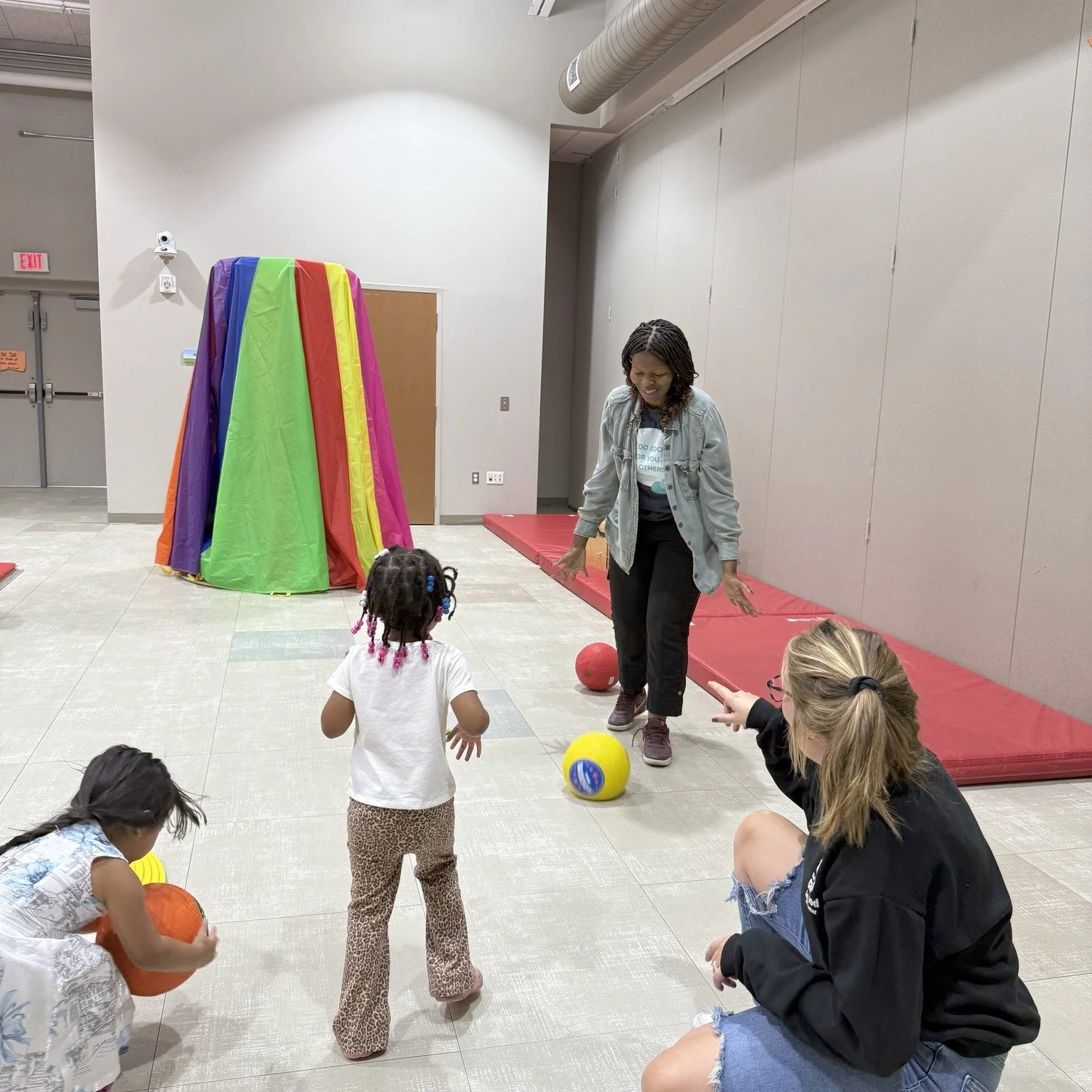 Asendo Team volunteering/having fun with children at the Childhood League Center