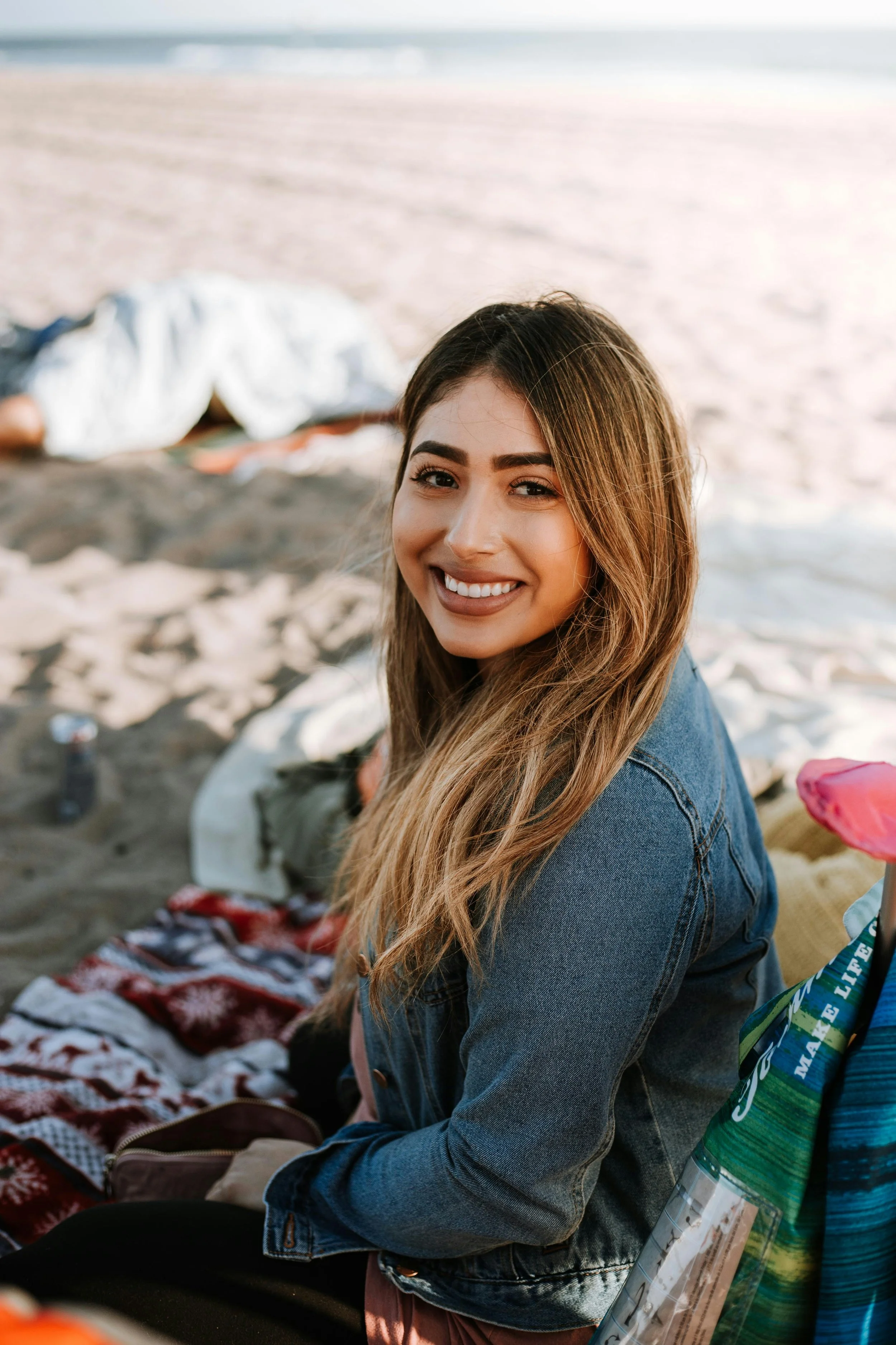 Hispanic woman, gathered for Bliss Wellness Collective community.