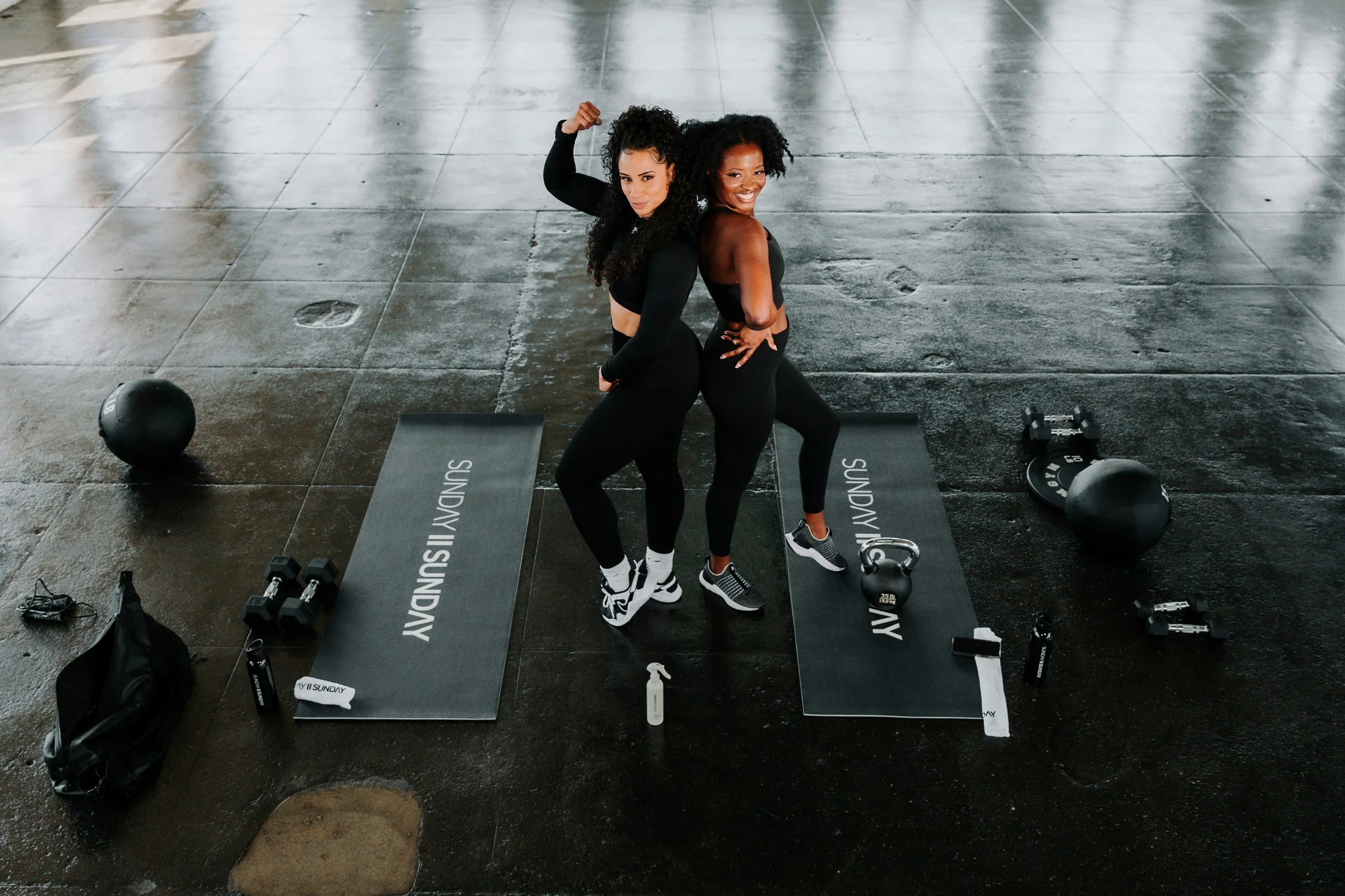 Diverse women working out to build strength with Bliss Wellness Collective DE.