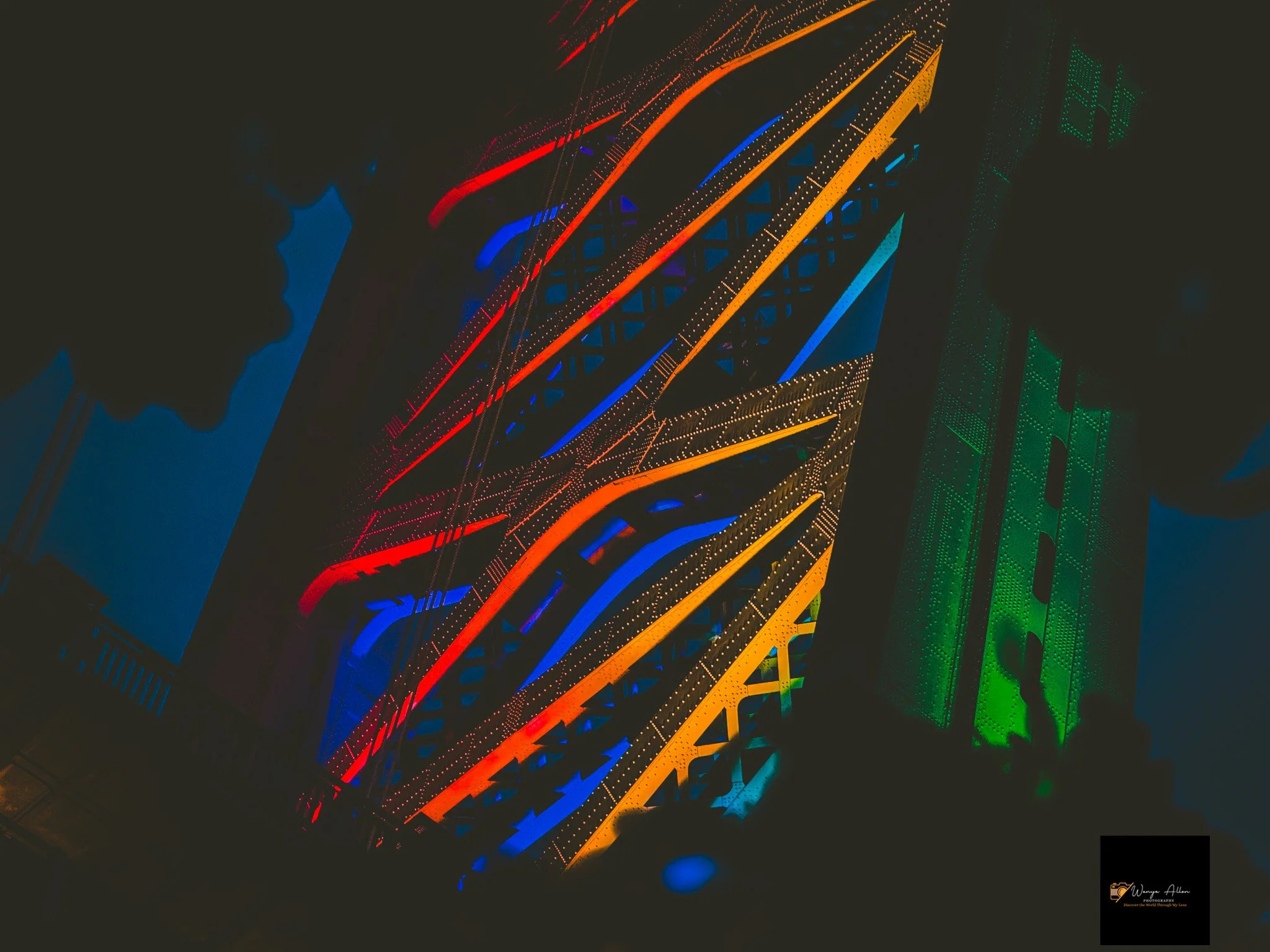 A Beacon of Pride: The Benjamin Franklin Bridge Illuminated in Rainbow Glory