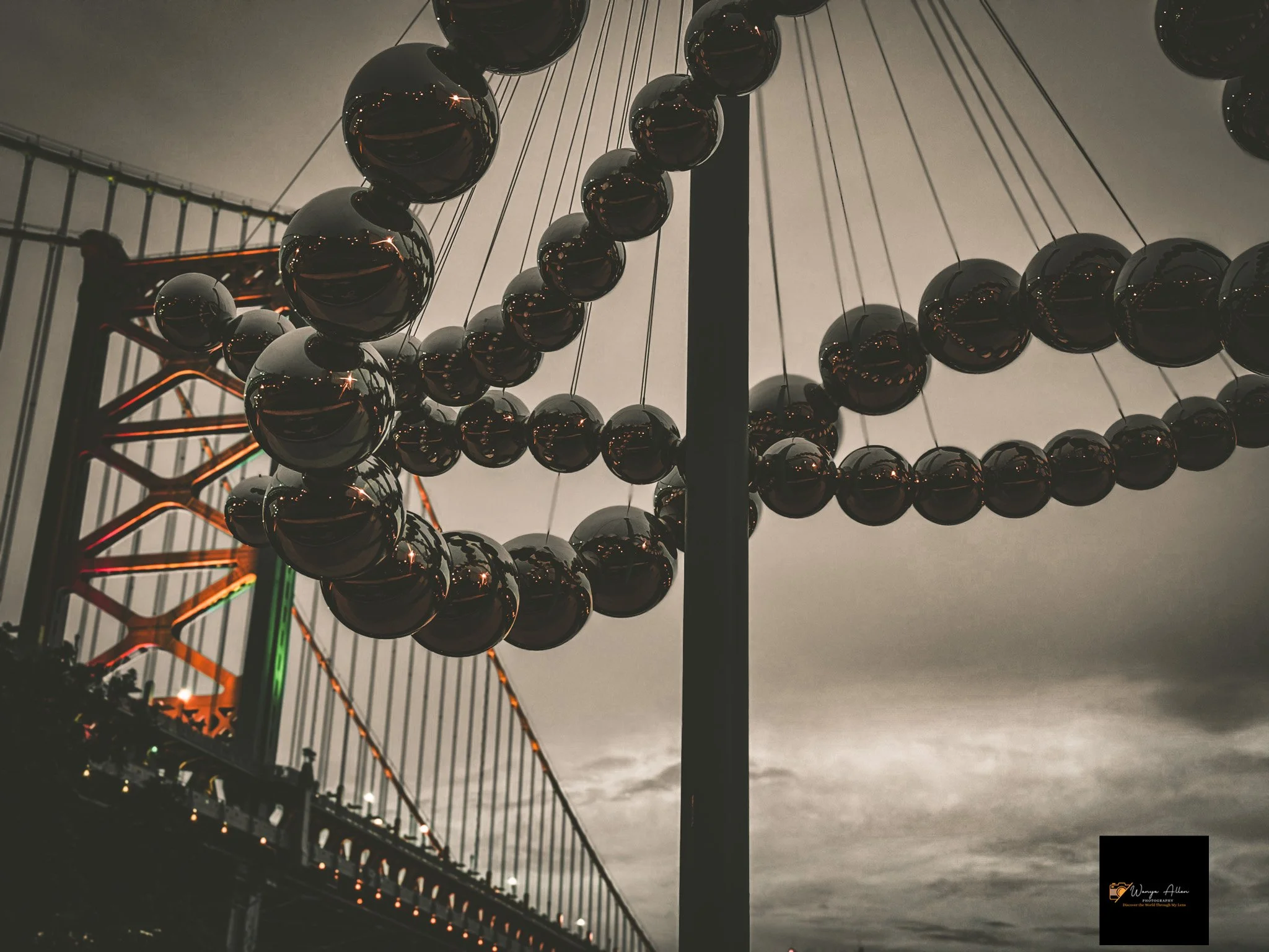 A Beacon of Pride: The Benjamin Franklin Bridge Illuminated in Rainbow Glory